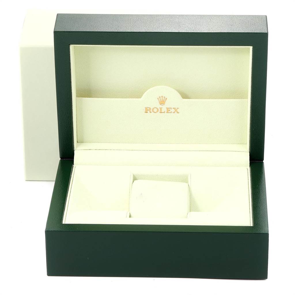 The image shows an open case for a Rolex Explorer 16570 Men
s Stainless Steel Black Dial 16570 Men
s Stainless Steel Black Dial model watch, displaying its interior compartments.