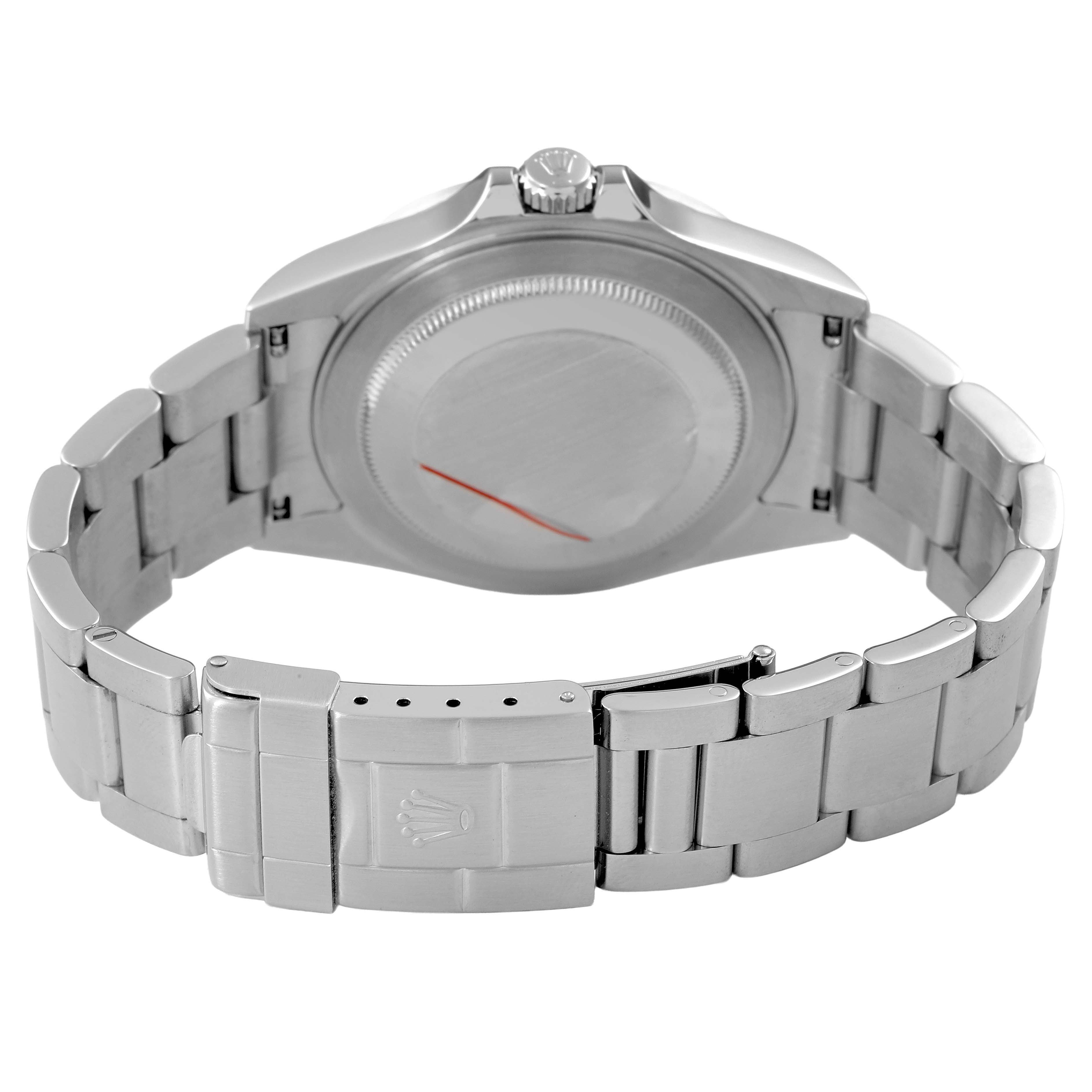 The image shows the back of a Rolex Explorer 16570 Men's Stainless Steel Black Dial watch, highlighting the case back, bracelet, and clasp.