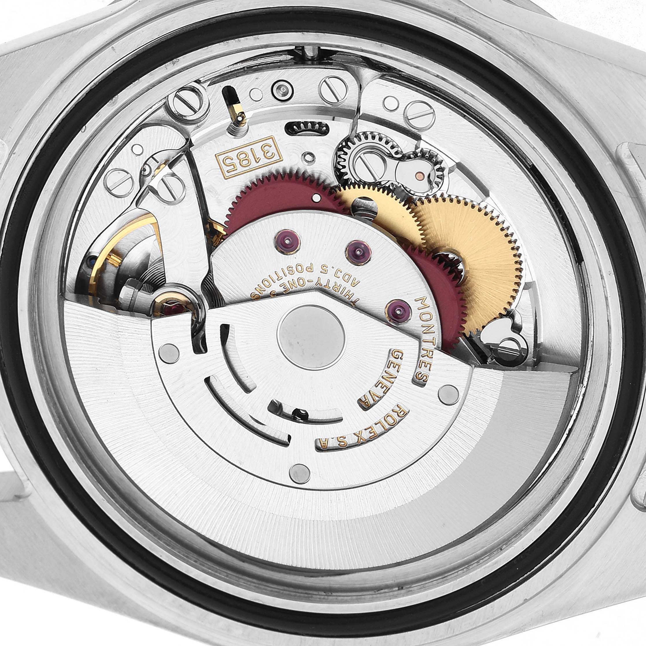 The image shows the internal movement mechanism of a Rolex Explorer 16570 Men's Stainless Steel White Dial watch from a top-down angle.