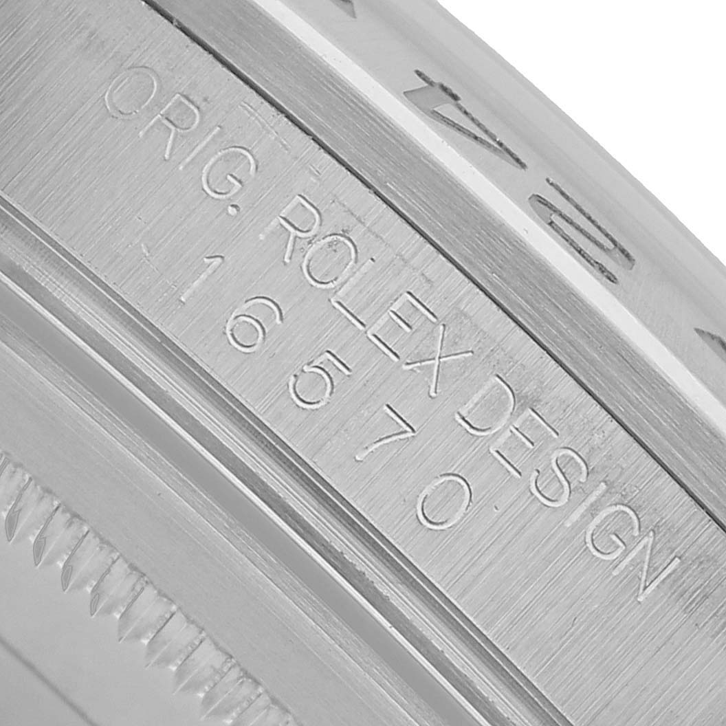The image shows the engraved side of the case body of the Rolex Explorer 16570 Men's Stainless Steel White Dial Model 16570, displaying its design reference.