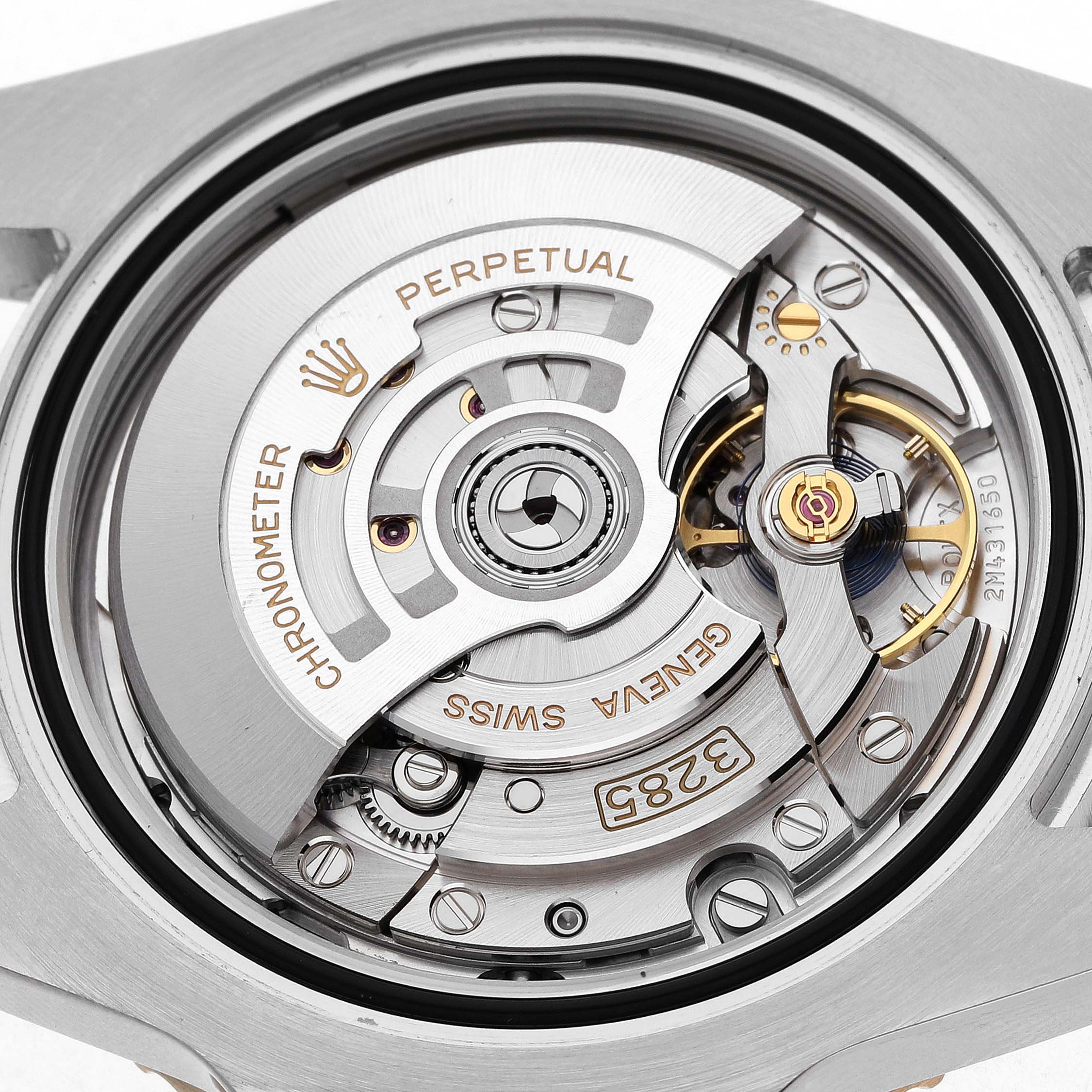 This image shows the movement of a Rolex GMT-Master 126713GRNR Men's Stainless Steel Black Dial watch from a top-down angle, highlighting its intricate components.