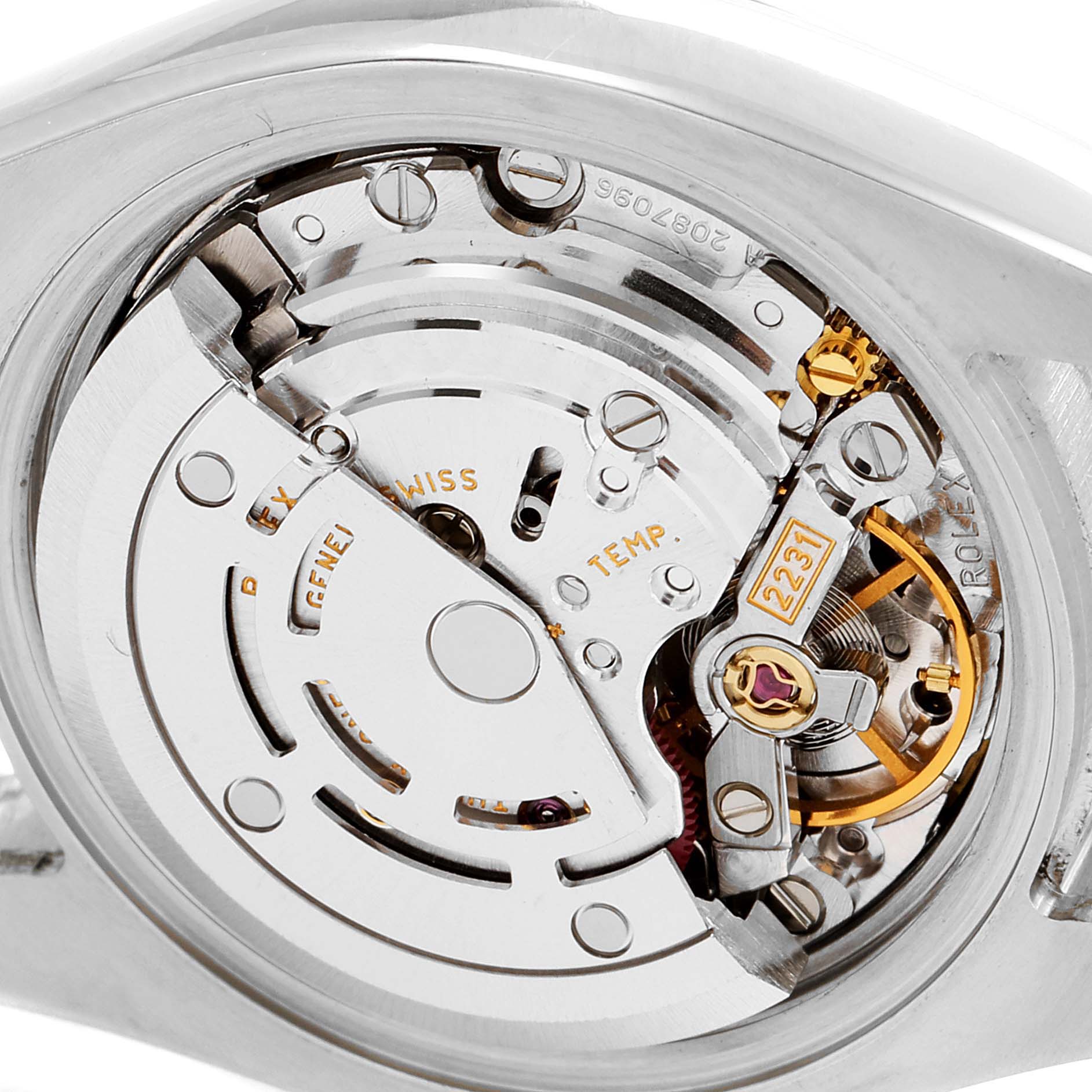 This image shows a close-up view of the movement mechanism inside a Rolex Oyster Perpetual 176200 Women's Stainless Steel Black Dial 176200 Women's Stainless Steel Black Dial watch.