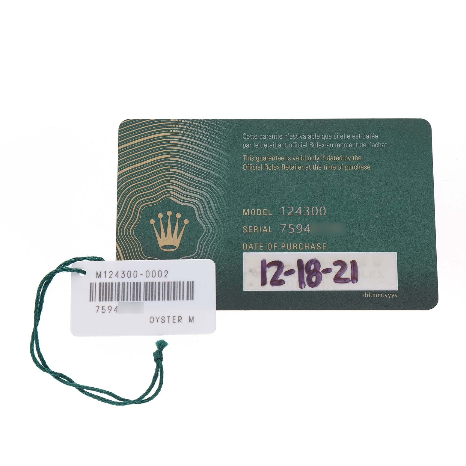 The image shows a warranty card and tag for a Rolex Oyster Perpetual 7594Z726 Men's Stainless Steel Black Dial model 124300 watch.