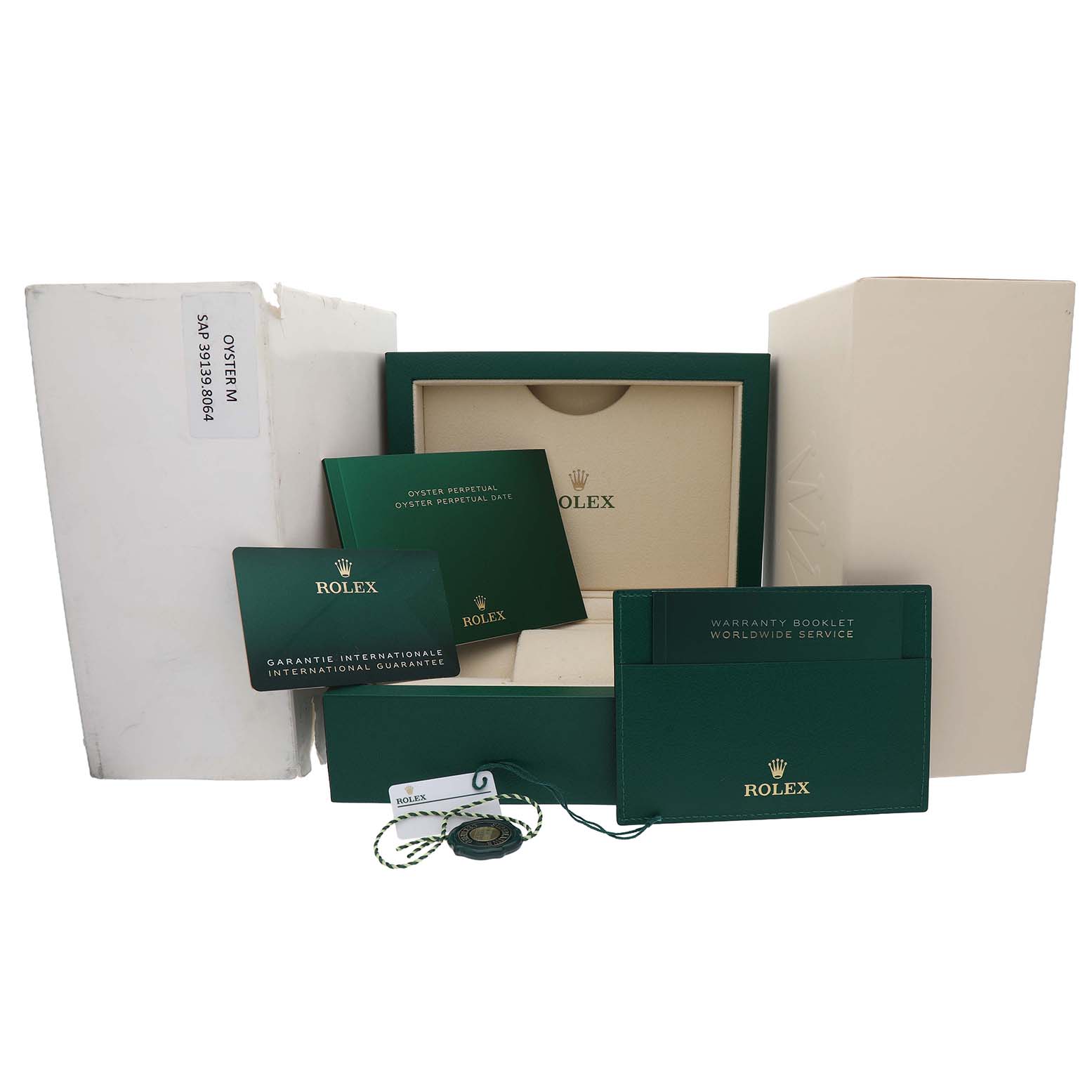 The image shows packaging and accessories for a Rolex Oyster Perpetual 7594Z726 Men's Stainless Steel Black Dial watch, including boxes, booklets, and tags.