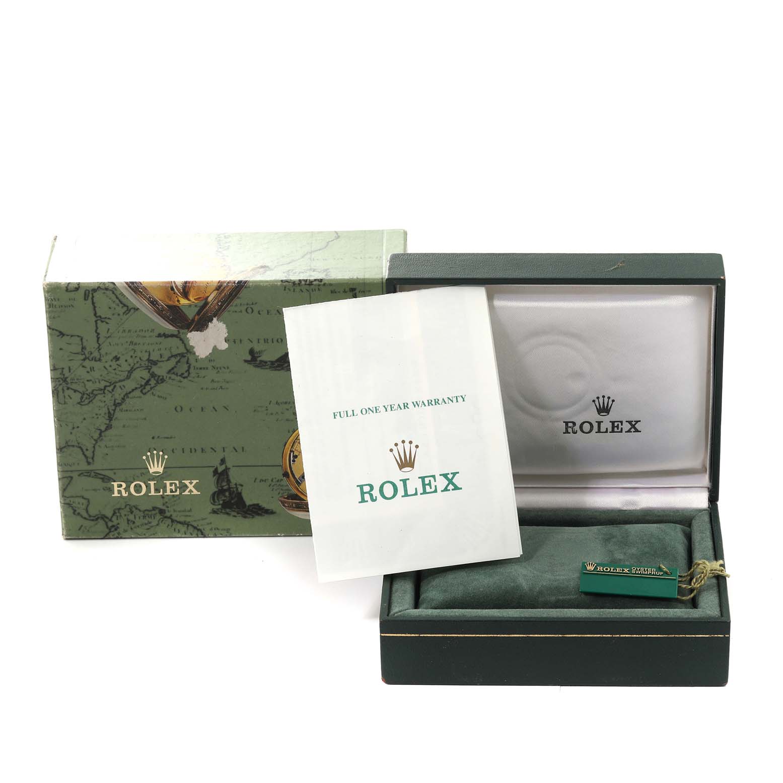The image shows the packaging, a warranty card, and the green box for the Rolex Mid-Size 77080 Women
s Stainless Steel Silver Dial 77080 Women
s Stainless Steel Silver Dial model, viewed from the top.