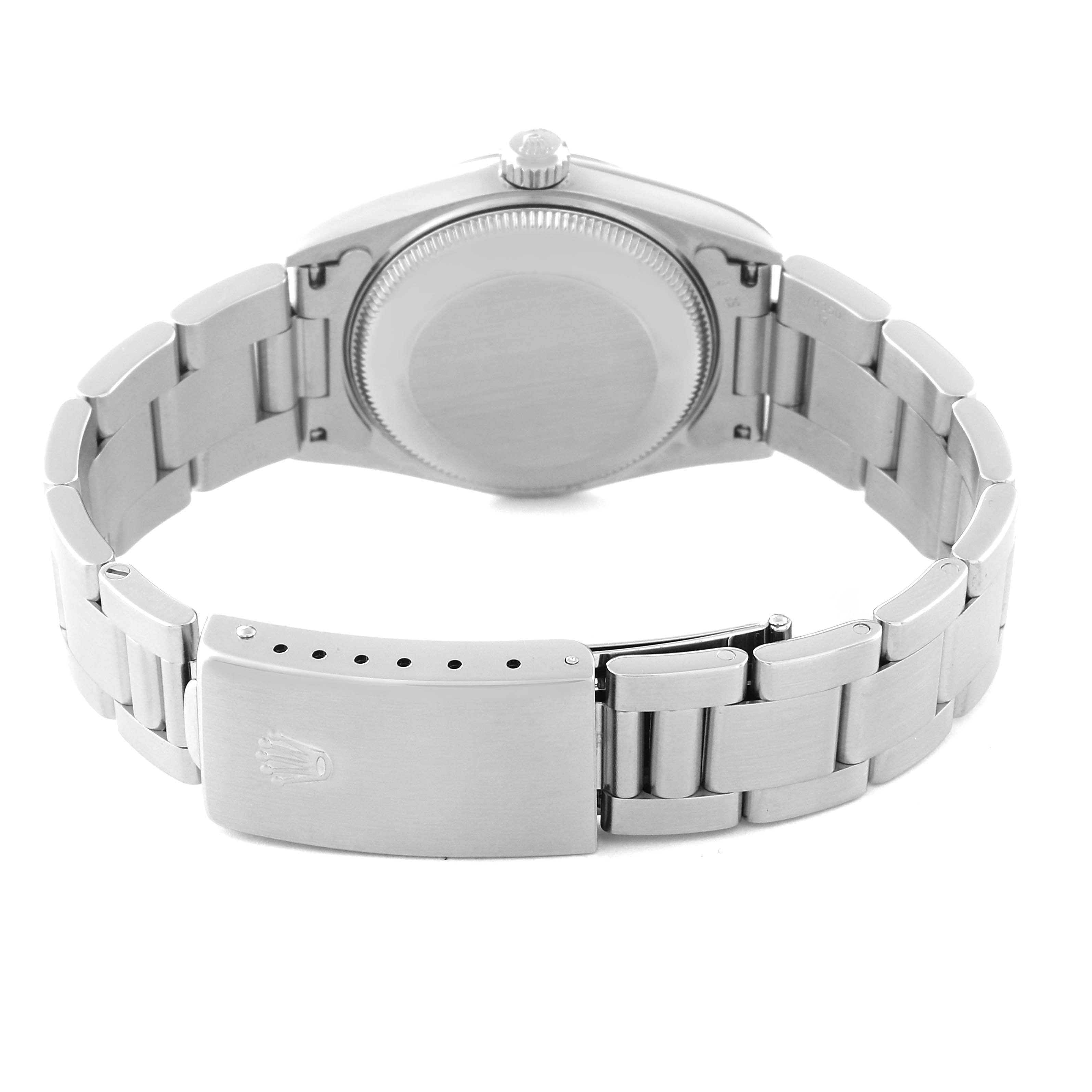 The image shows the backside and clasp of a Mid-Size Rolex watch, displaying the bracelet and closed case back.