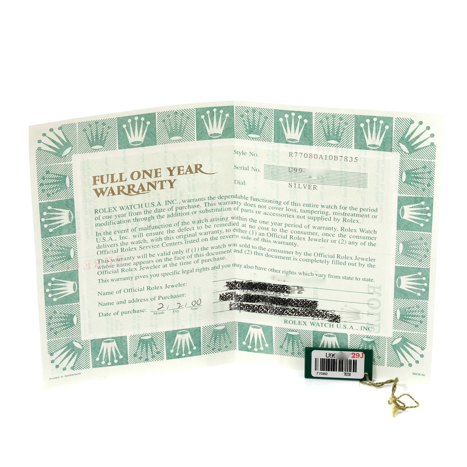 The image shows a warranty document and tag for a Mid-Size Rolex watch, model and serial numbers included.