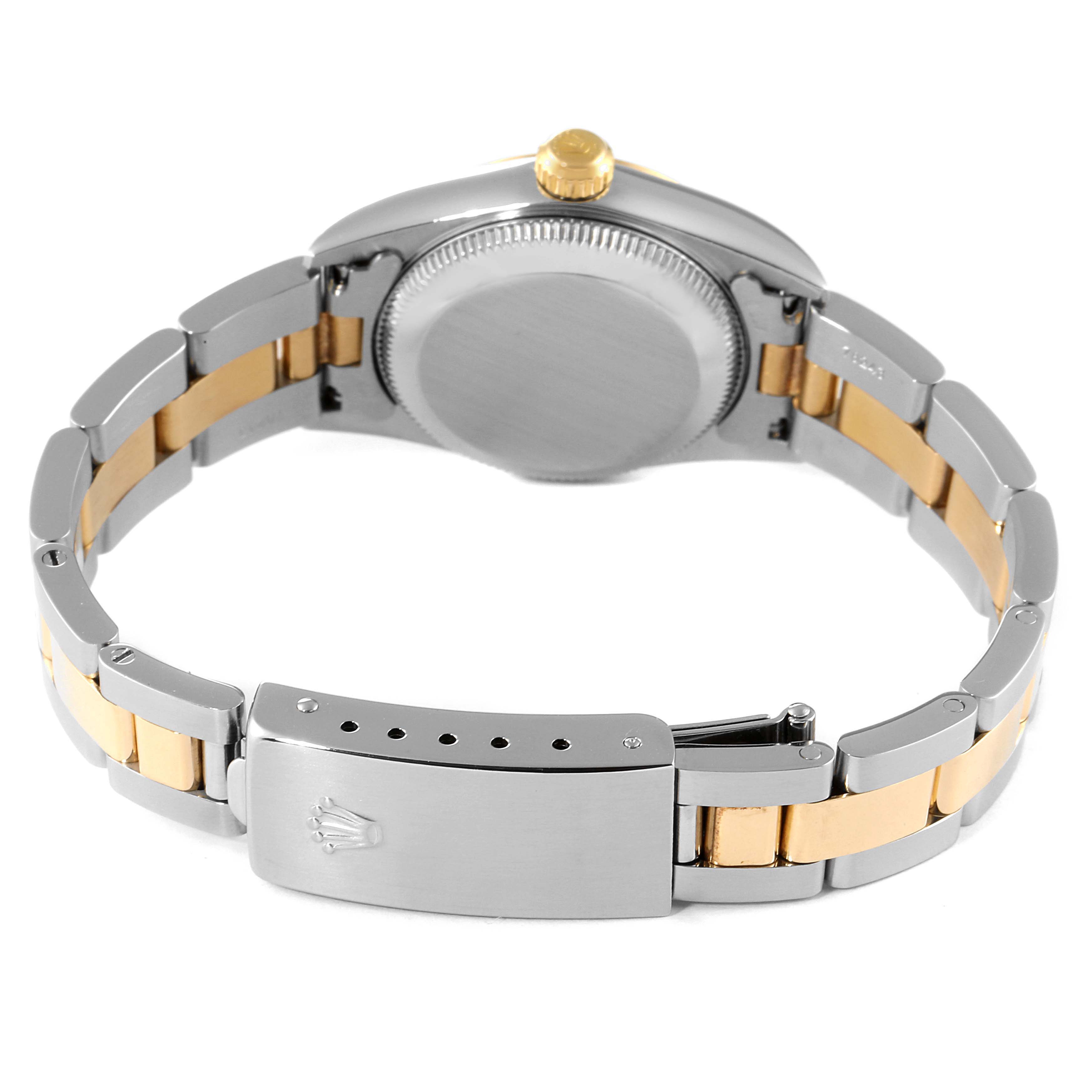 This image shows the Oyster Perpetual model by Rolex from the back, highlighting the case and bracelet clasp.