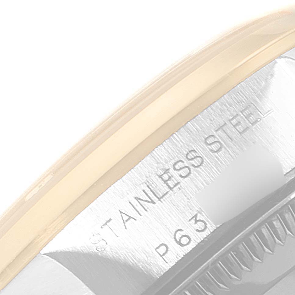 This close-up image shows the side of the case and bezel of a Rolex Oyster Perpetual 76183 Women's Steel and Gold (two tone) White Dial 76183 Women's Steel and Gold (two tone) White Dial watch, emphasizing its stainless steel material.
