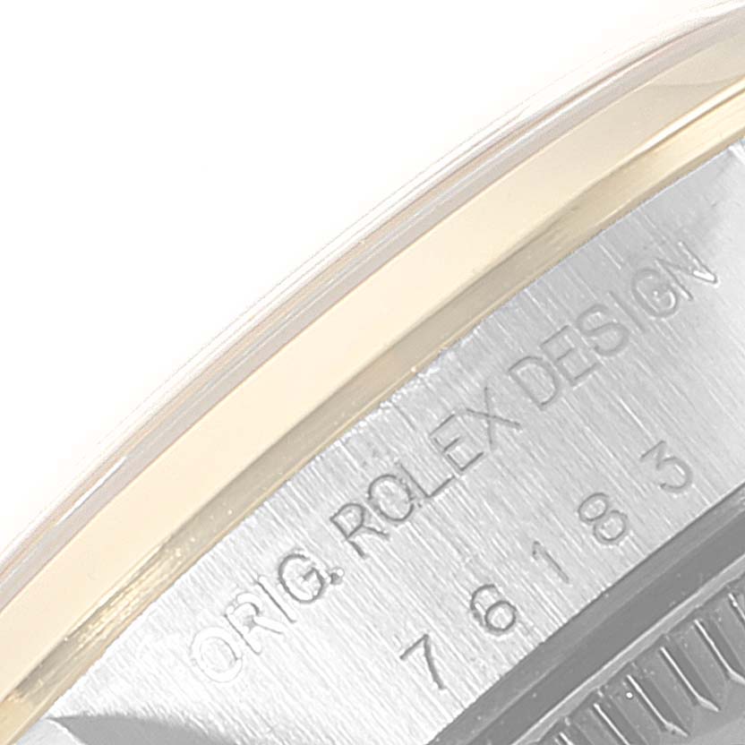This close-up image shows the side engraving of the case back on a Rolex Oyster Perpetual 76183 Women's Steel and Gold (two tone) White Dial 76183 Women's Steel and Gold (two tone) White Dial model.