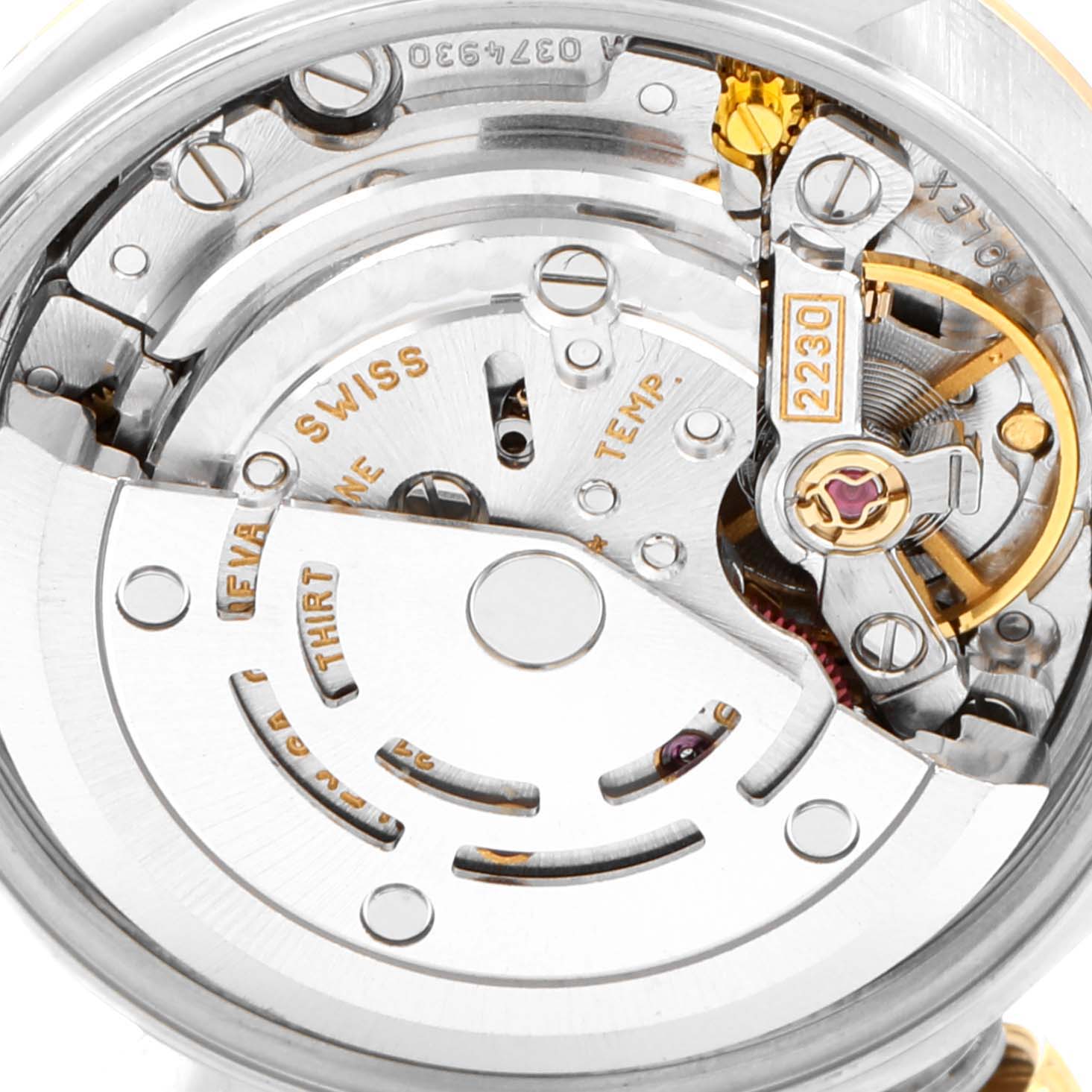 This image shows the internal movement mechanism of a Rolex Oyster Perpetual 76183 Women's Steel and Gold (two tone) White Dial 76183 Women's Steel and Gold (two tone) White Dial watch at a close-up angle.