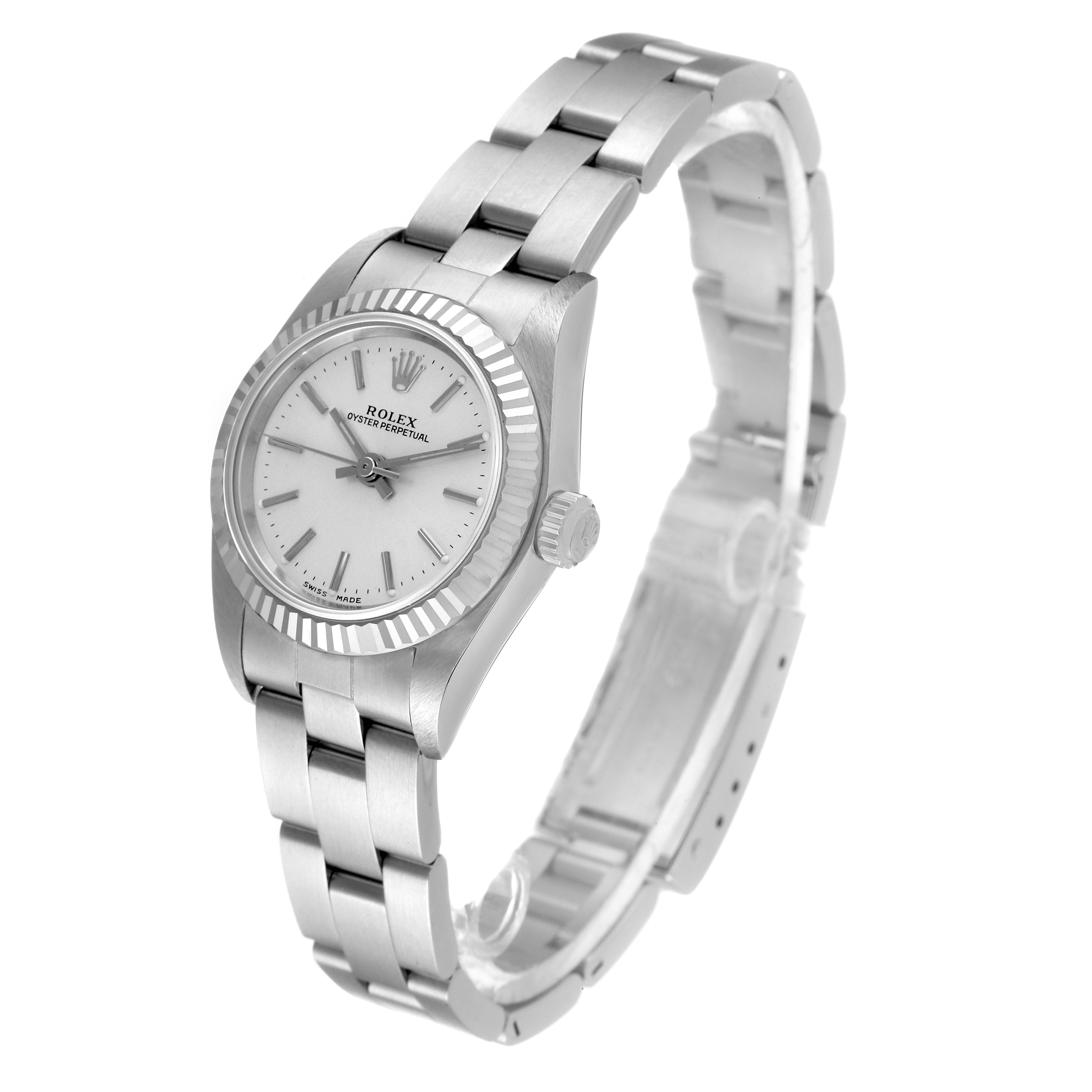 This image shows a Rolex Oyster Perpetual 76094 Women
s Stainless Steel Silver Dial 76094 Women
s Stainless Steel Silver Dial watch, angled to display its face, bezel, crown, and bracelet.
