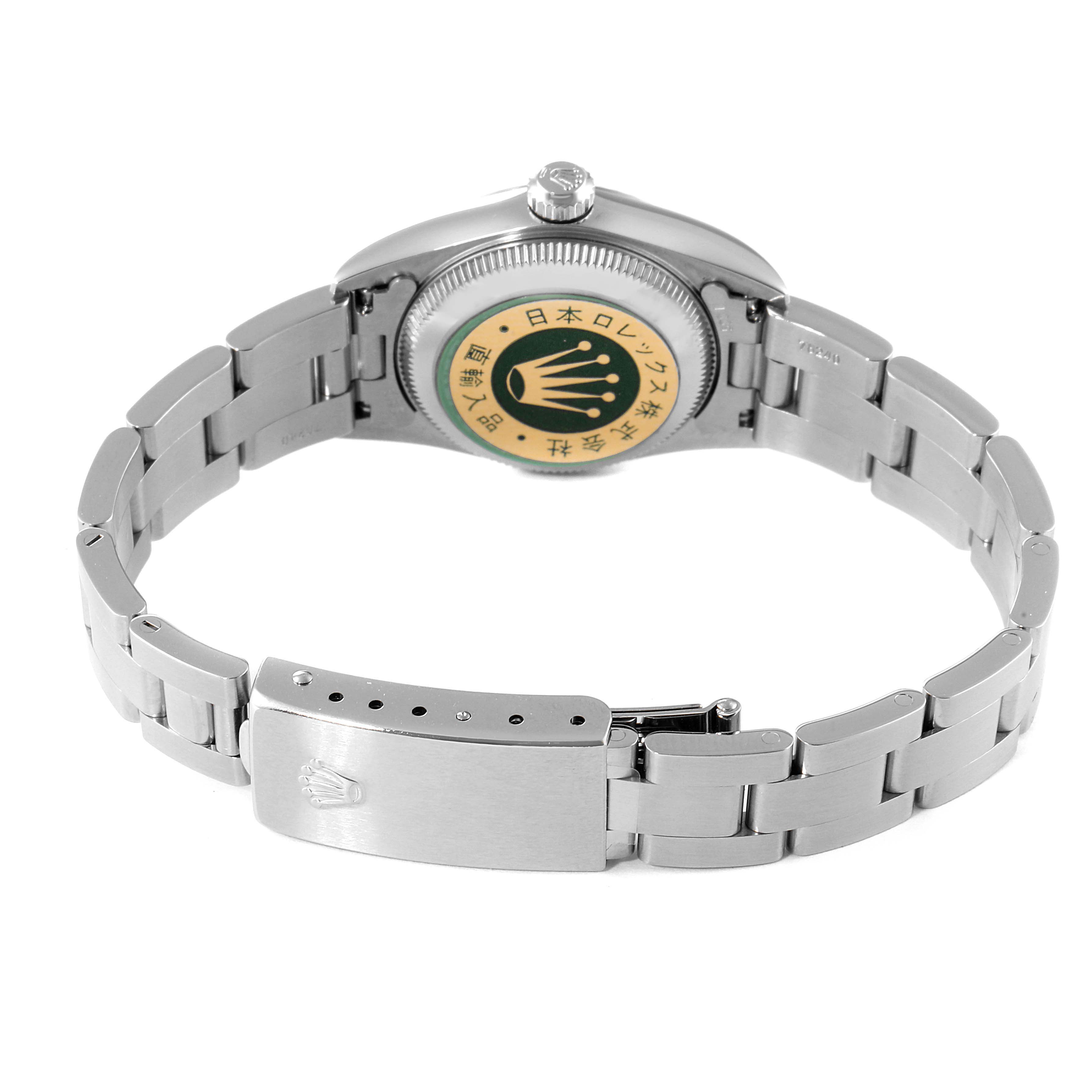The image shows the back and bracelet of a Rolex Oyster Perpetual 76094 Women
s Stainless Steel Silver Dial 76094 Women
s Stainless Steel Silver Dial watch, with the case back and clasp visible.