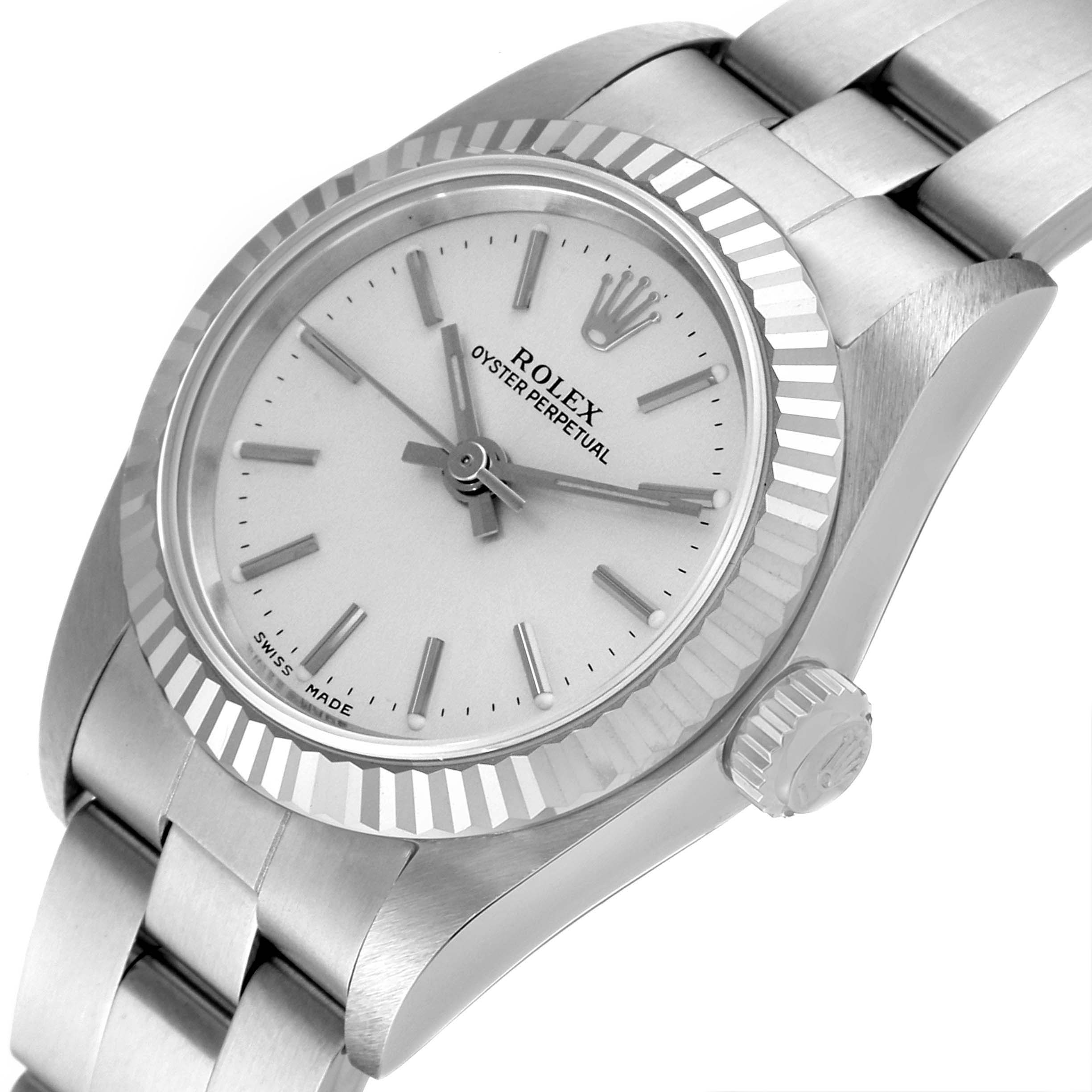 This image shows a close-up, angled view of a Rolex Oyster Perpetual 76094 Women
s Stainless Steel Silver Dial 76094 Women
s Stainless Steel Silver Dial watch, including the face, bracelet, bezel, and crown.