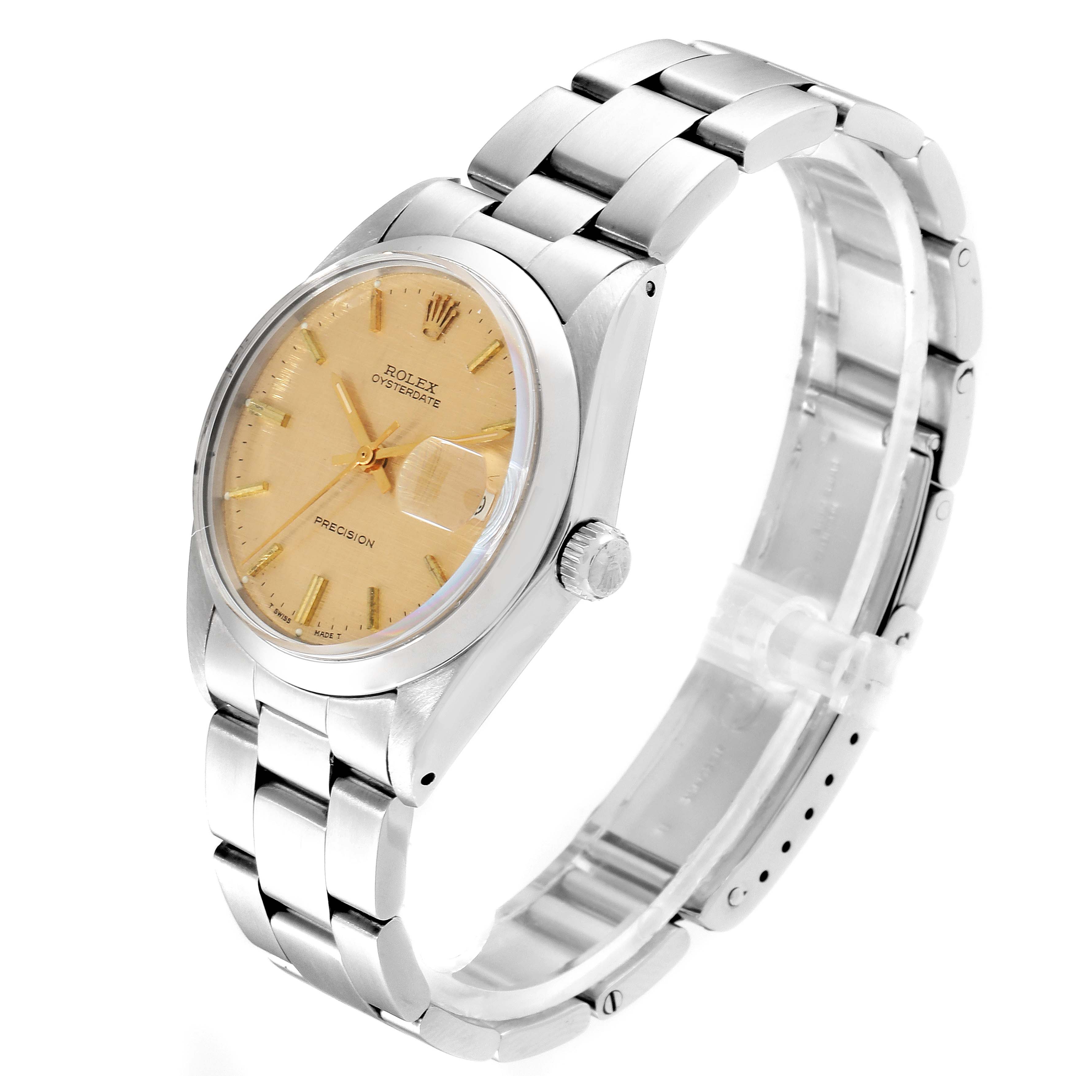 This is a side-angle view of the Rolex Vintage Collection 6694 Men's Stainless Steel Champagne Dial 6694 Men's Stainless Steel Champagne Dial watch, showing the dial, crown, and bracelet.