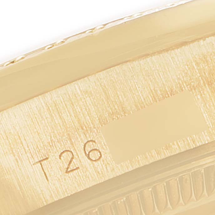 The close-up image shows part of the bezel and serial number engraving of a Rolex President 68288 Women
s Yellow Gold Champagne Dial 68288 Women
s Yellow Gold Champagne Dial model watch.