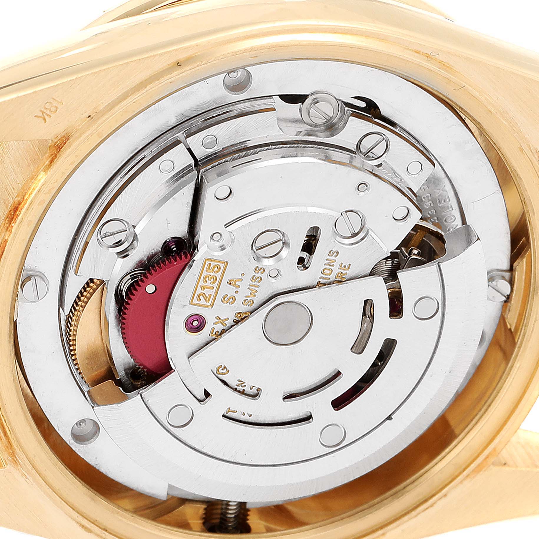 This image shows a close-up view of the movement mechanism inside the President model by Rolex watch.