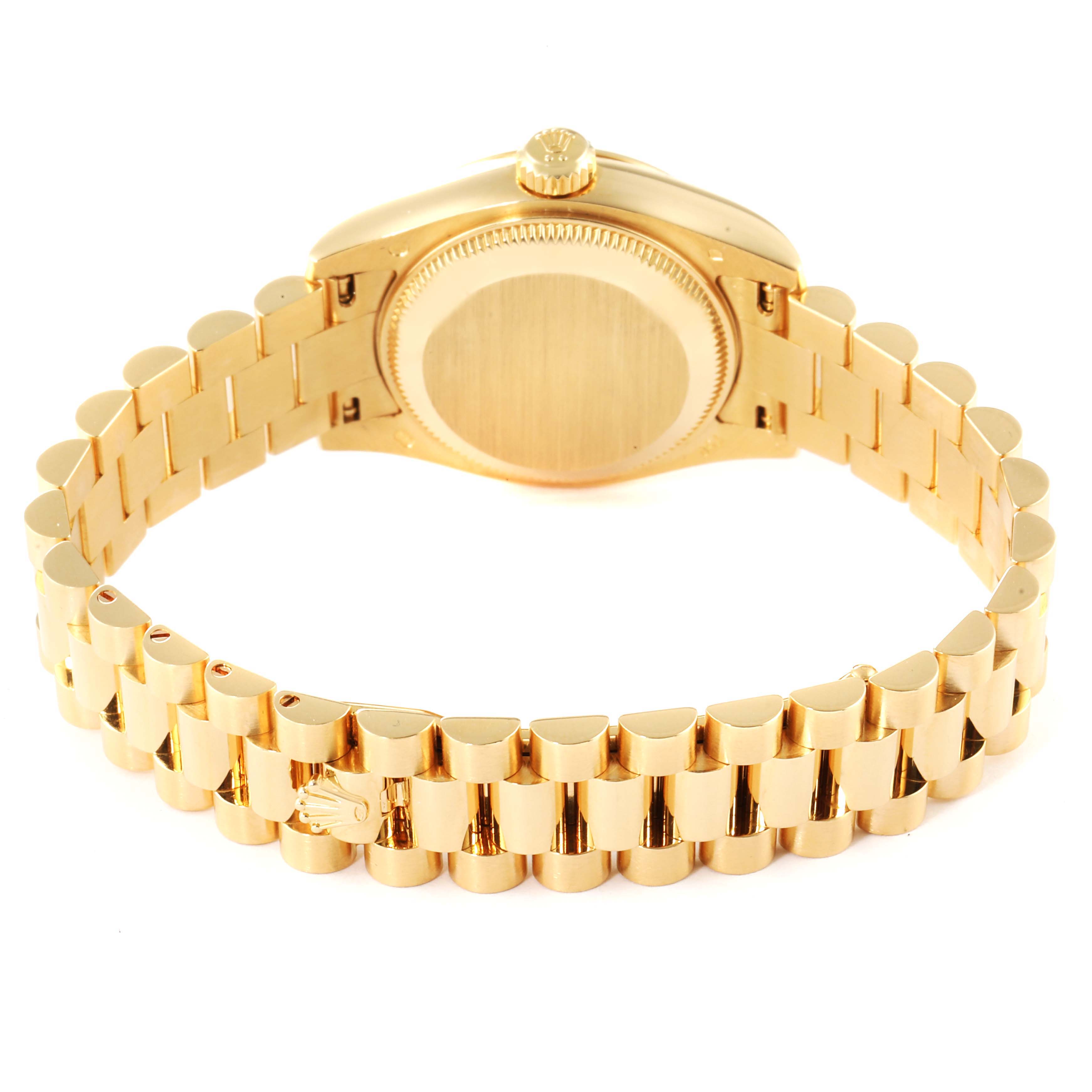 This image shows the back and bracelet of a gold Rolex President 179178 Women's Yellow Gold Champagne Dial 179178 Women's Yellow Gold Champagne Dial model watch, viewed from a slight angle.