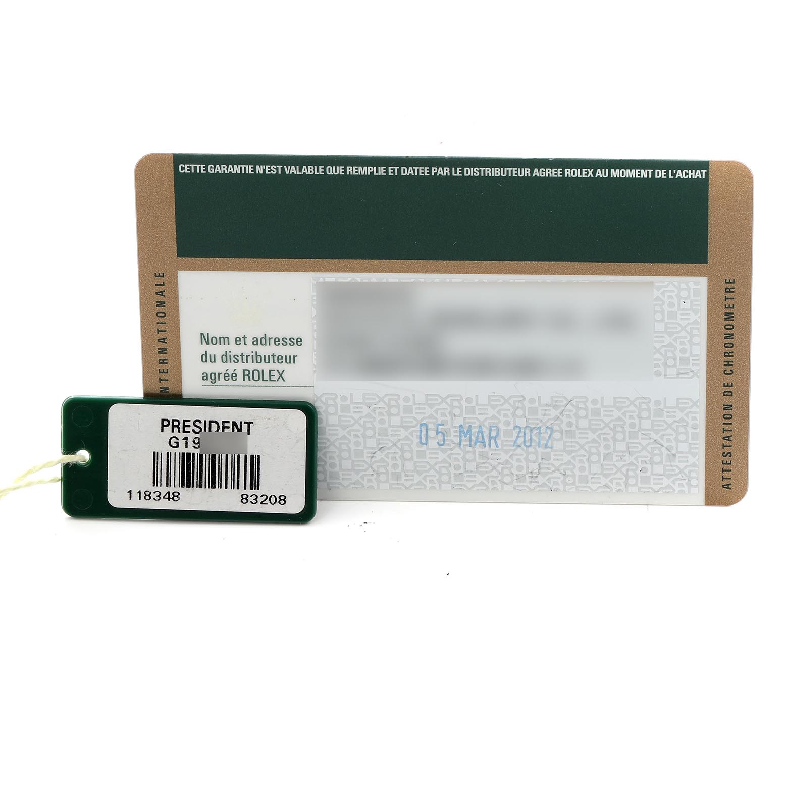 The image shows a Rolex President 118348 Men's Yellow Gold Mother of Pearl Dial 118348 Men's Yellow Gold Mother of Pearl Dial watch tag and a warranty card angled toward the front.