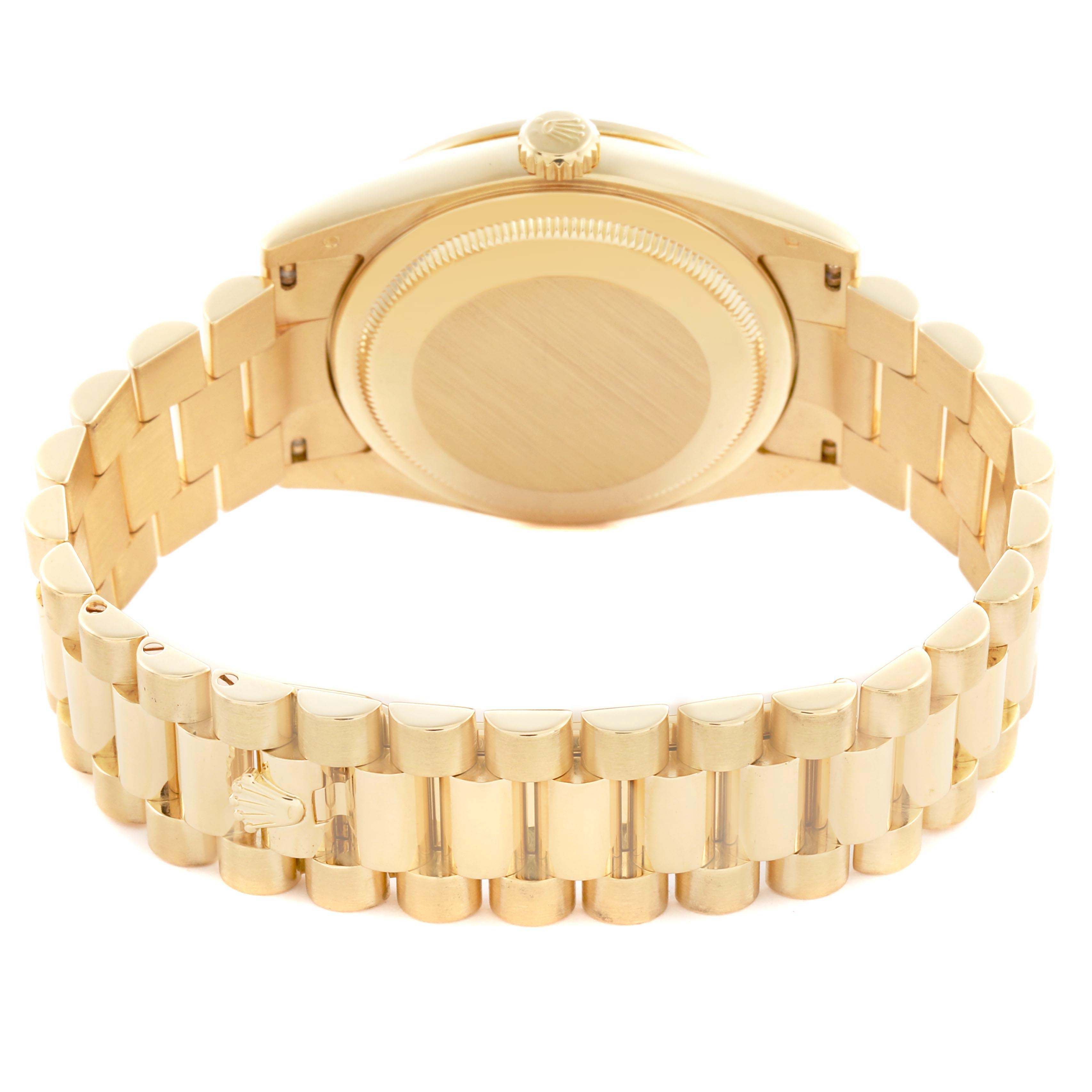 The Rolex President 118348 Men's Yellow Gold Mother of Pearl Dial 118348 Men's Yellow Gold Mother of Pearl Dial model is shown from the back, displaying its case back and gold bracelet.