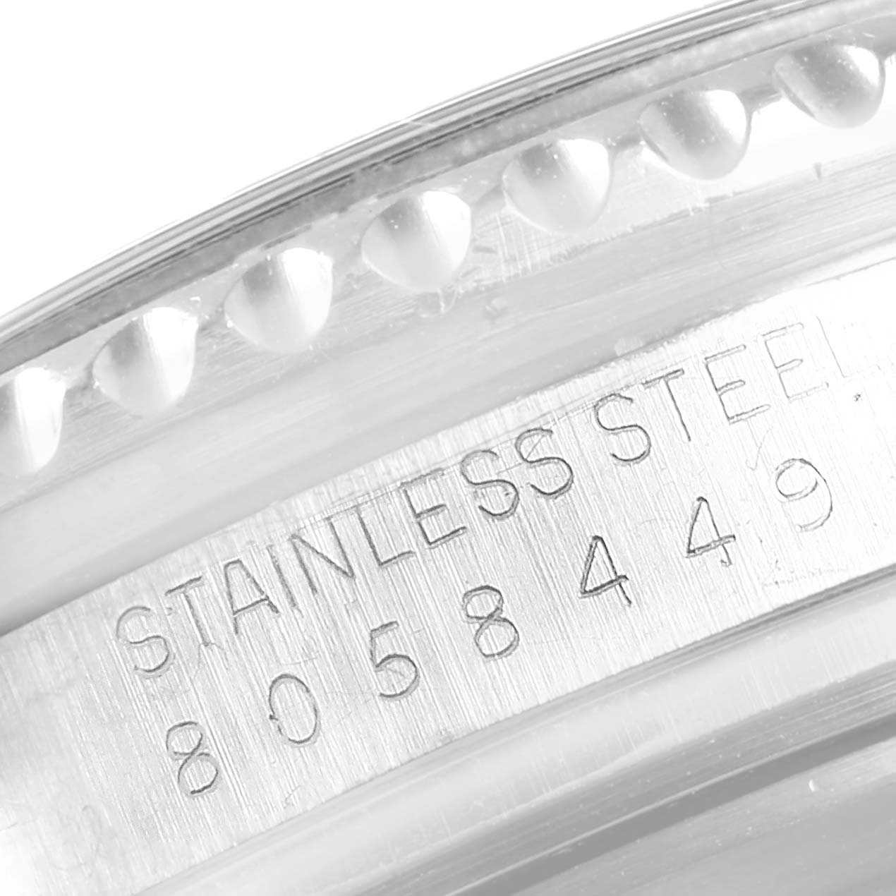 This image shows a close-up angle of the engravings on the case back of the Rolex 16660 Men's Stainless Steel Black Dial 16660 Men's Stainless Steel Black Dial Seadweller Automatic Steel Vintage Mens Watch 16660.