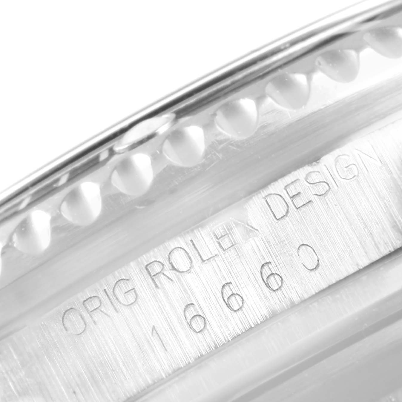 This is a close-up image focusing on the engraved model number and part of the bezel of the Rolex 16660 Men's Stainless Steel Black Dial 16660 Men's Stainless Steel Black Dial Seadweller Automatic Steel Vintage Mens Watch 16660.