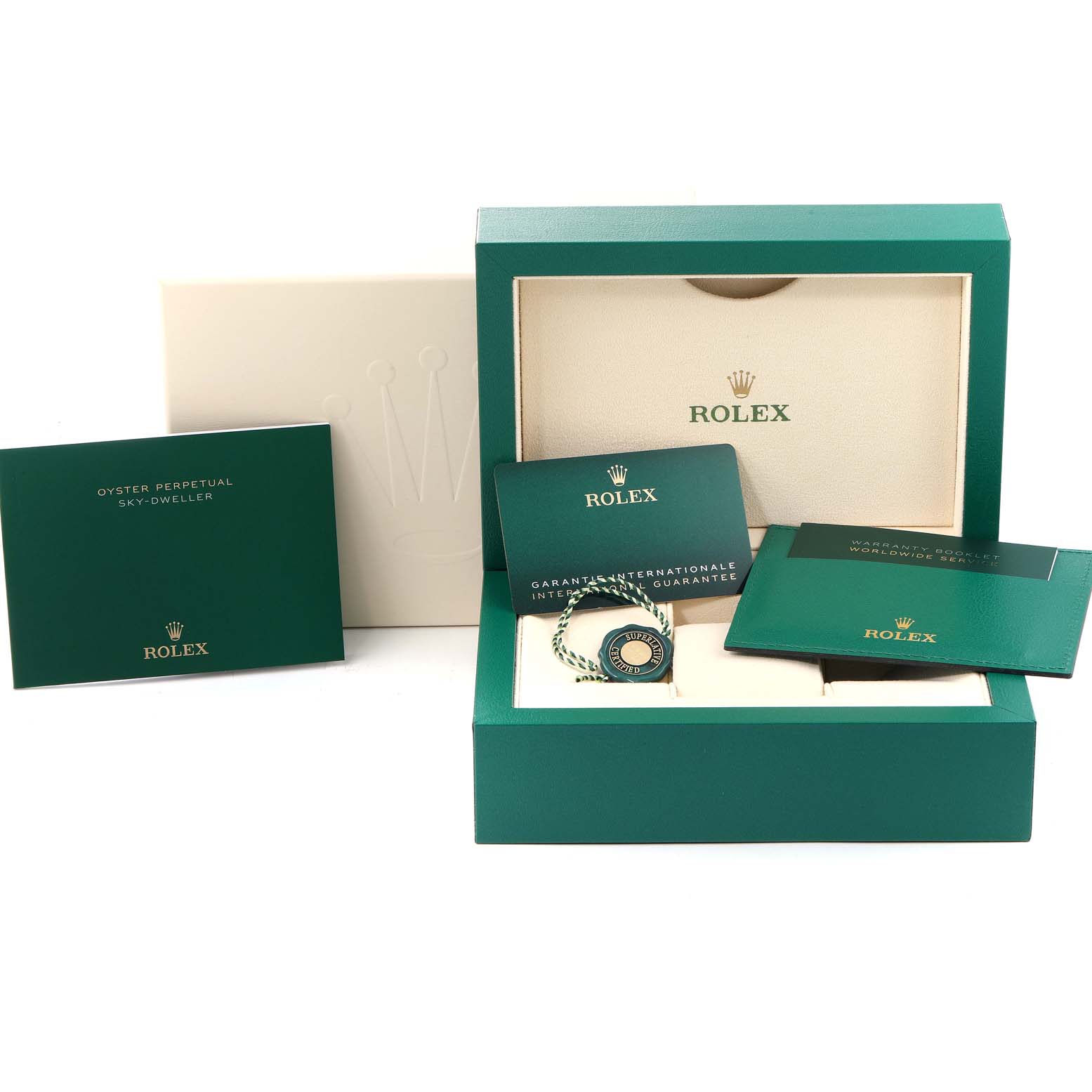 The image shows the packaging and documentation for a Rolex Sky-Dweller 326933 Men's Steel and Gold (two tone) Champagne Dial 326933 Men's Steel and Gold (two tone) Champagne Dial watch, including manuals, guarantee card, and the box.
