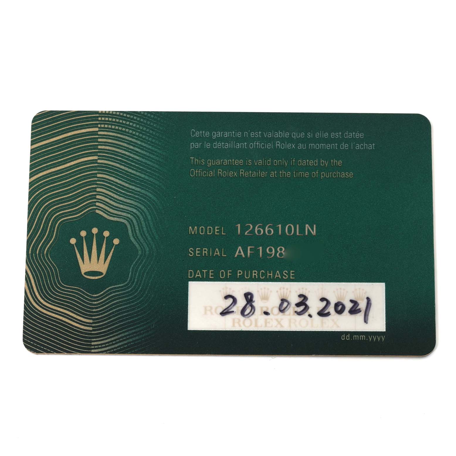 The image shows the warranty card of the Rolex Submariner 126610LN Men
s Stainless Steel Black Dial 126610LN Men
s Stainless Steel Black Dial model 126610LN, including the serial number and purchase date.