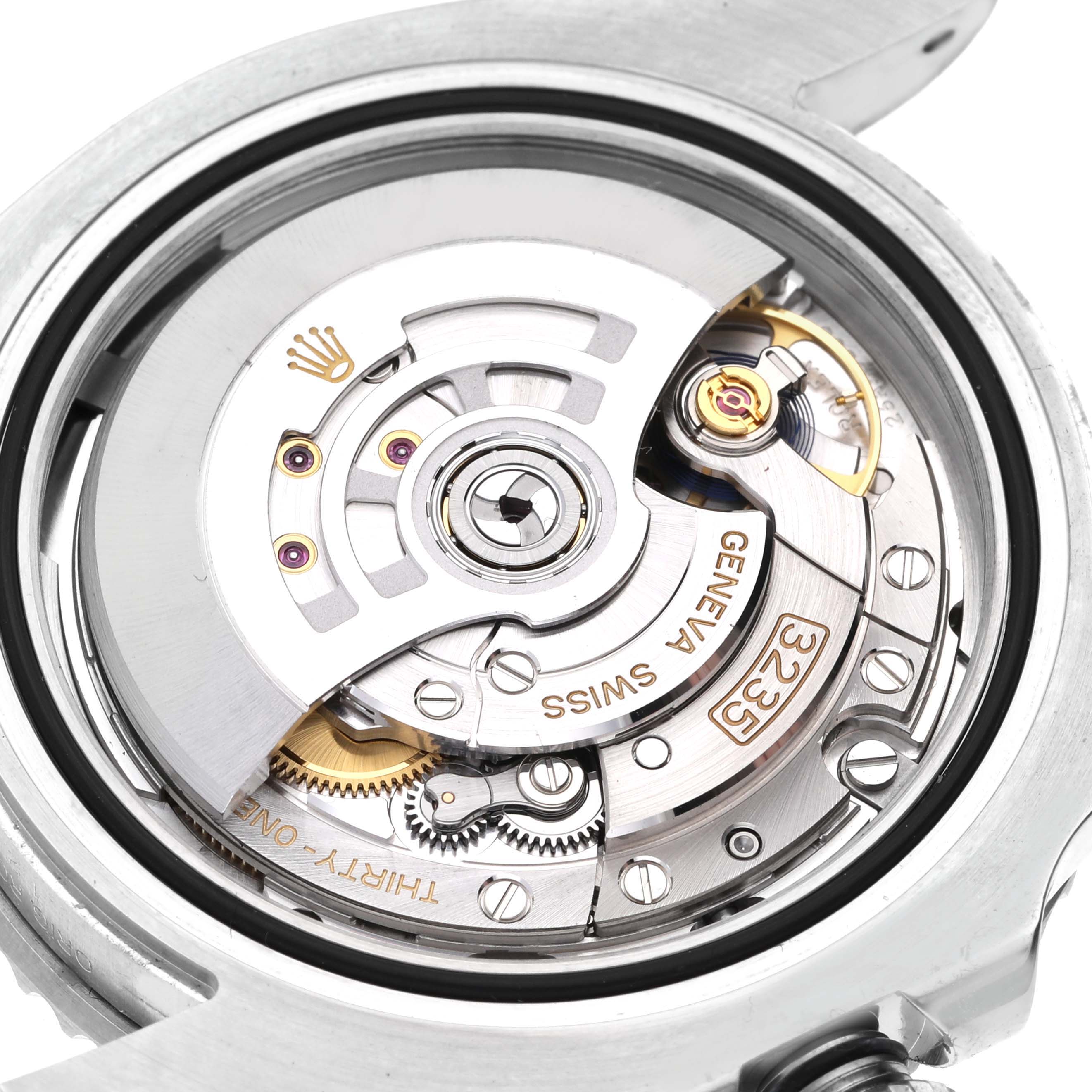 The image shows the open case back of a Rolex Submariner 126610LN Men
s Stainless Steel Black Dial 126610LN Men
s Stainless Steel Black Dial watch, revealing its intricate automatic movement.