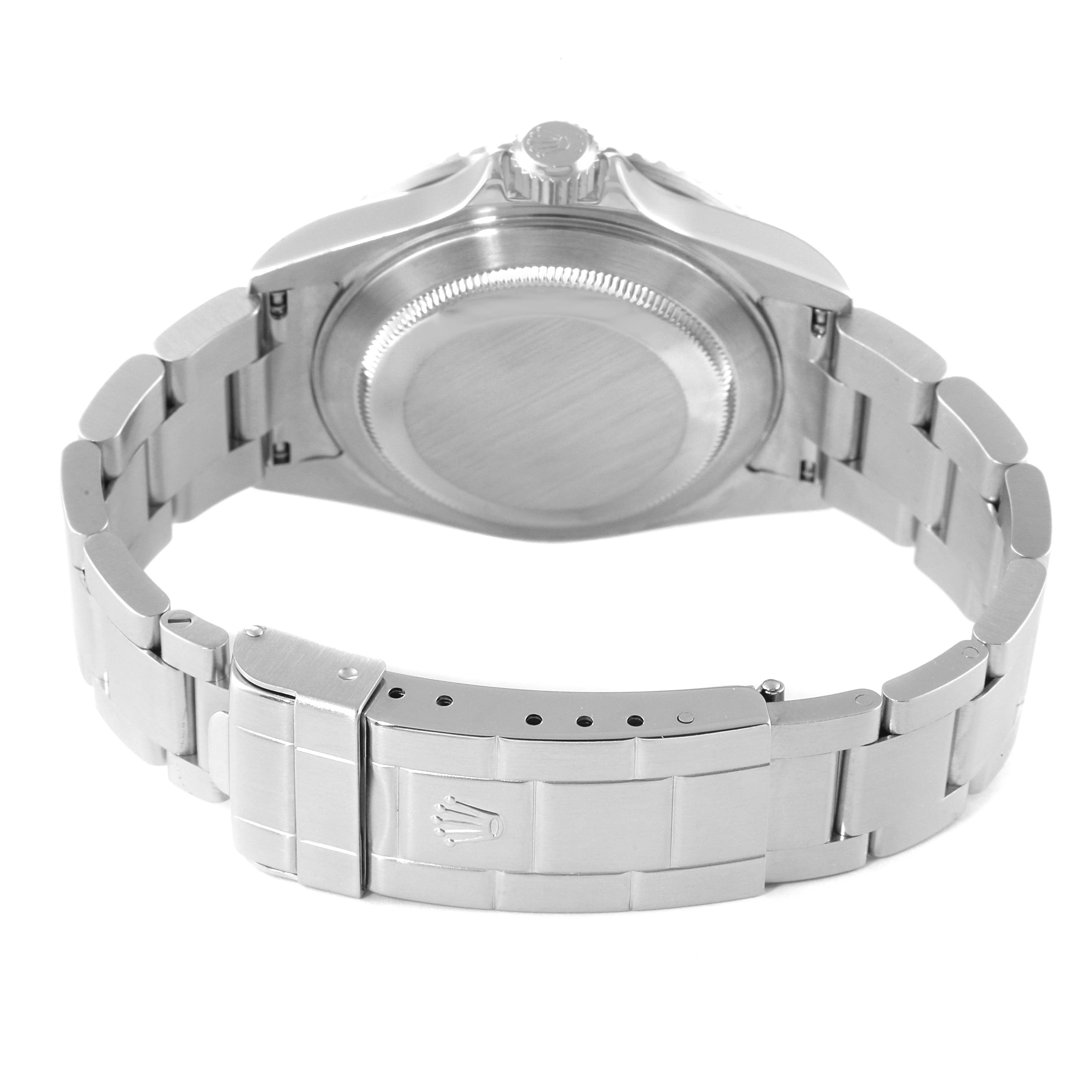 The image shows the back view of the Rolex Submariner 16610 Men
s Stainless Steel Black Dial 16610 Men
s Stainless Steel Black Dial, including the case back, bracelet, and clasp with the Rolex logo.