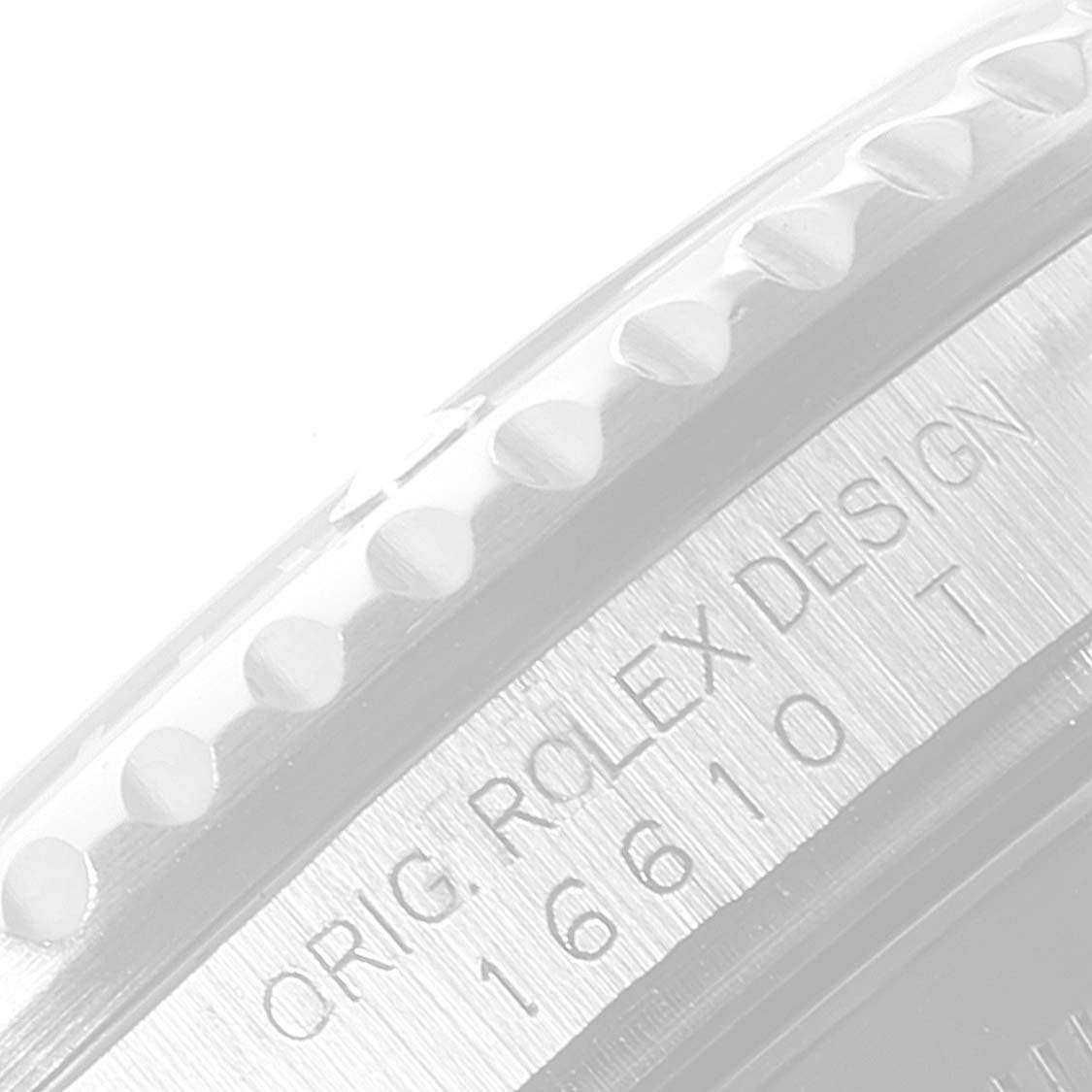 The image shows a close-up of the edge and engraved text on the side of a Rolex Submariner 16610 Men
s Stainless Steel Black Dial 16610 Men
s Stainless Steel Black Dial watch case.