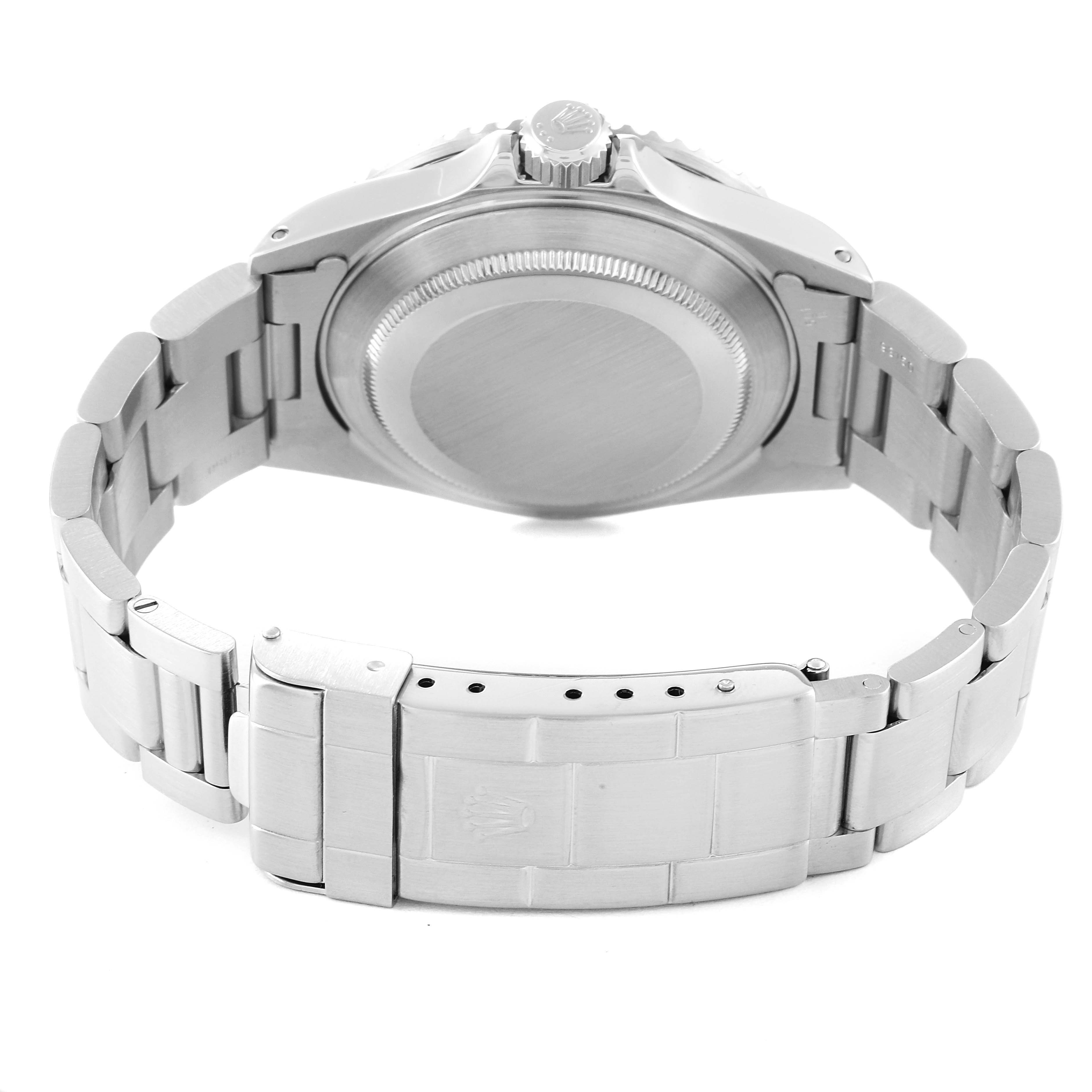 This image shows the back case and bracelet clasp of a Rolex Submariner 16610 Men
s Stainless Steel Black Dial 16610 Men
s Stainless Steel Black Dial watch from a bottom angle.