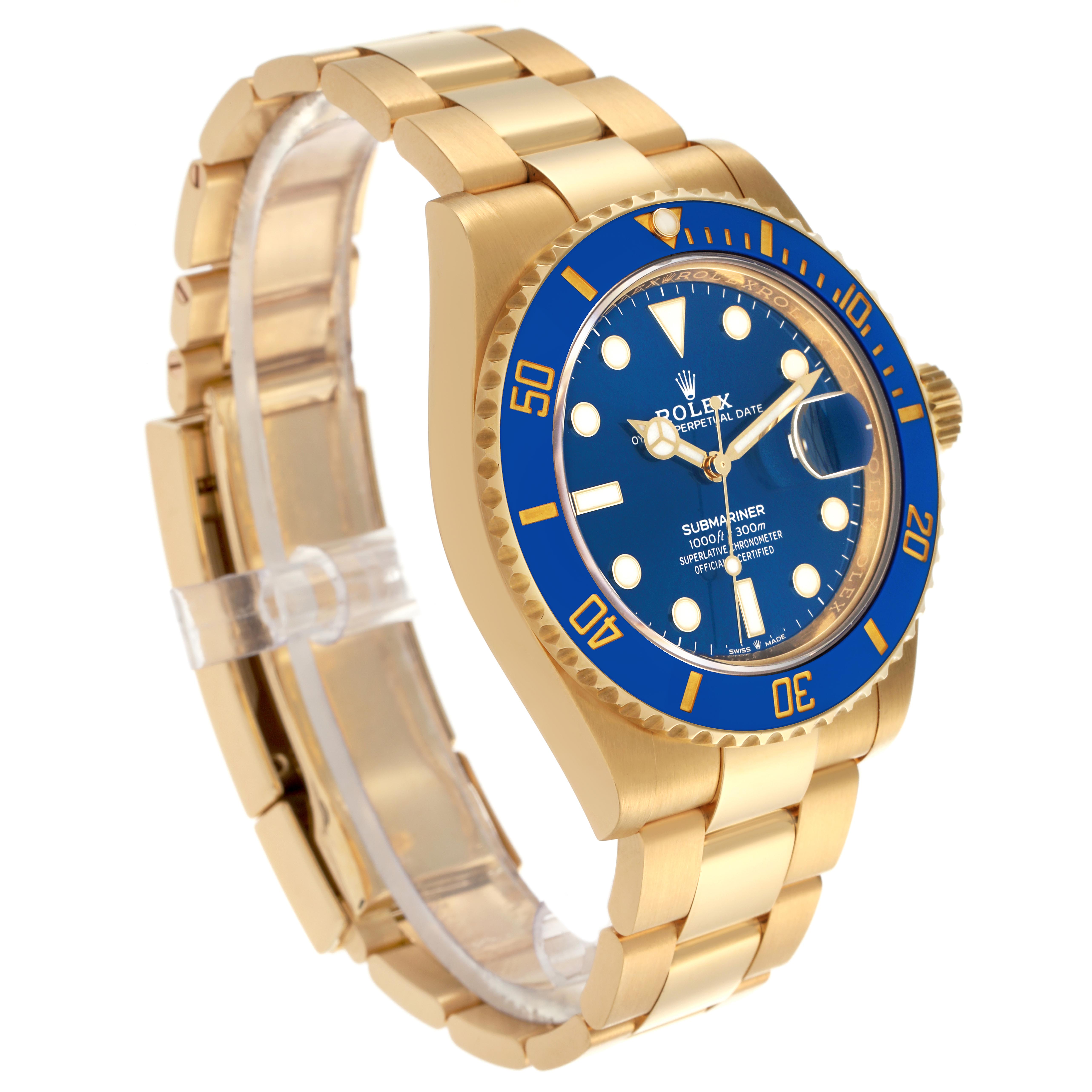 The Rolex Submariner 126618LB Men's Yellow Gold Blue Dial 126618LB Men's Yellow Gold Blue Dial watch is shown at a three-quarter angle, highlighting the blue and gold bezel, face, and gold bracelet.