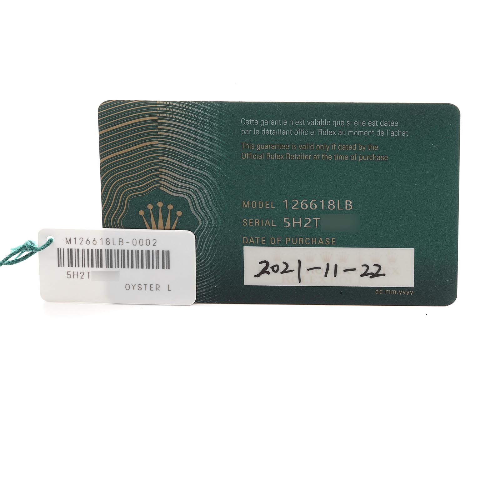 The image shows the warranty card and tag for the Rolex Submariner 126618LB Men's Yellow Gold Blue Dial 126618LB Men's Yellow Gold Blue Dial model 126618LB.