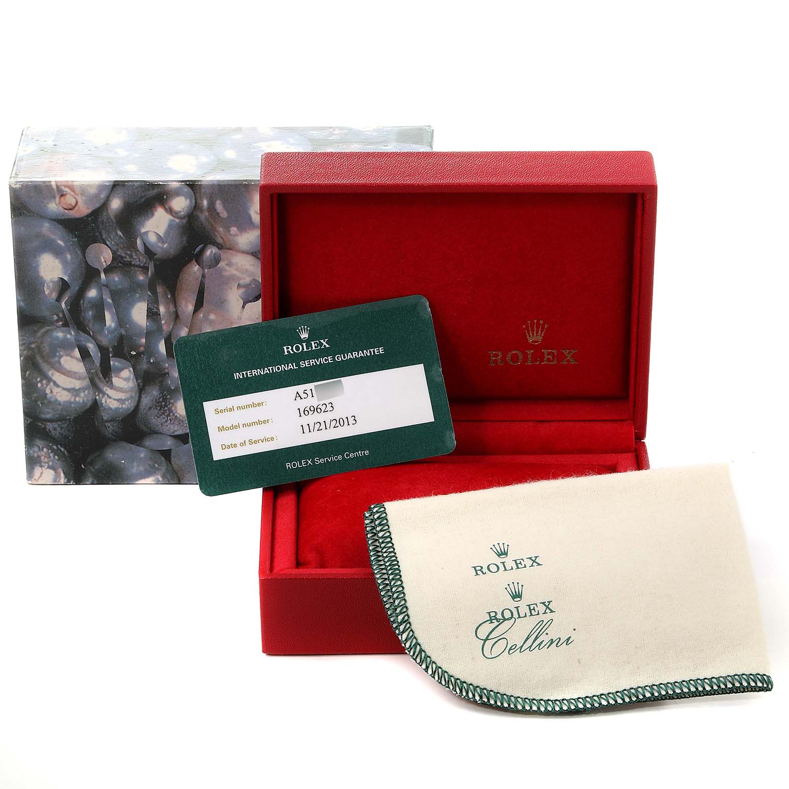 The image shows a Rolex Yacht-Master 169623 Women's Steel and Gold (two tone) White Dial 169623 Women's Steel and Gold (two tone) White Dial box, an authenticity card, a cleaning cloth, and an external packaging box.