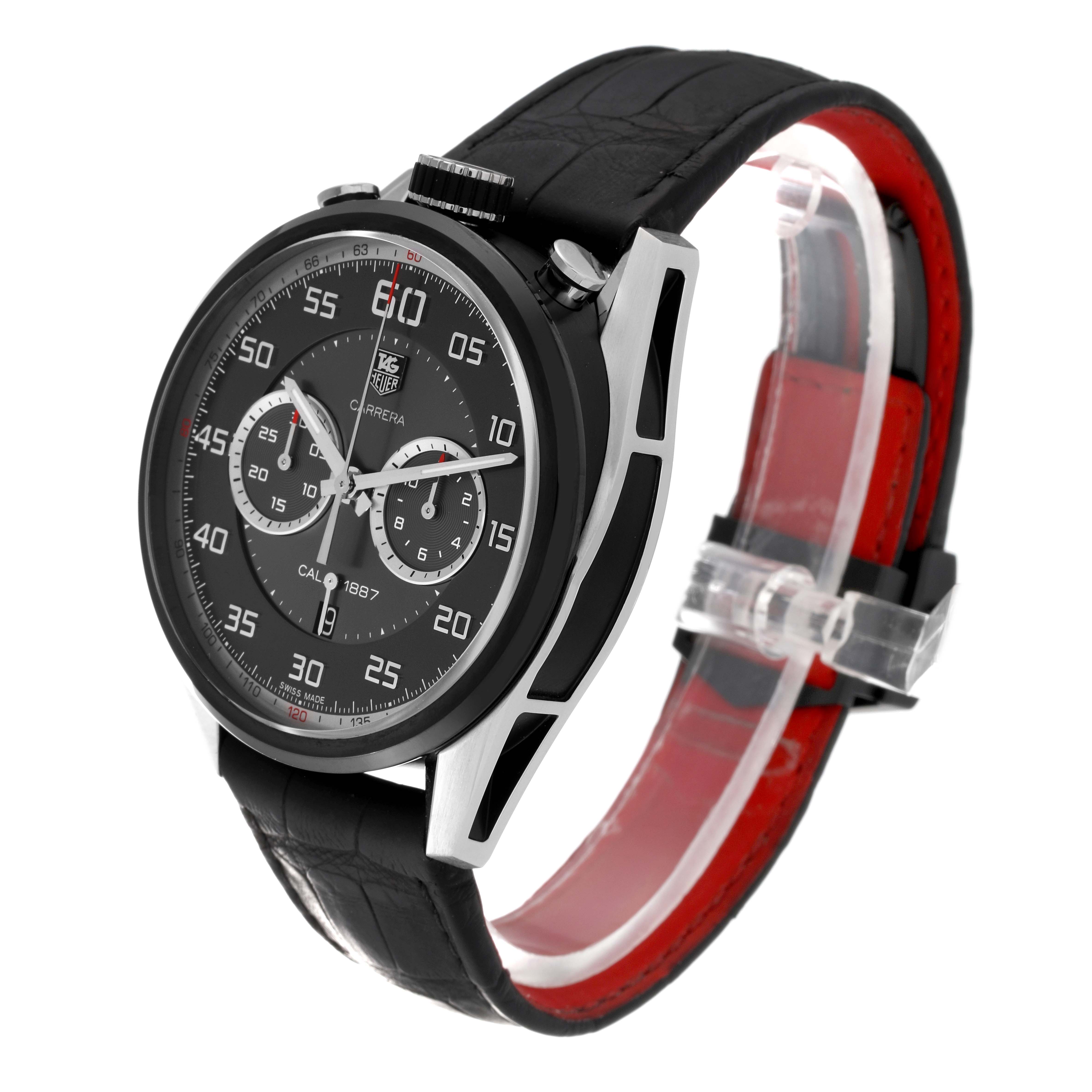 This Tag Heuer Carrera CAR2C12.FC6327 Men
s Stainless Steel Grey Dial CAR2C12.FC6327 Men
s Stainless Steel Grey Dial model watch is shown at an angled view, displaying its black dial, chronograph, and black leather strap with red interior.