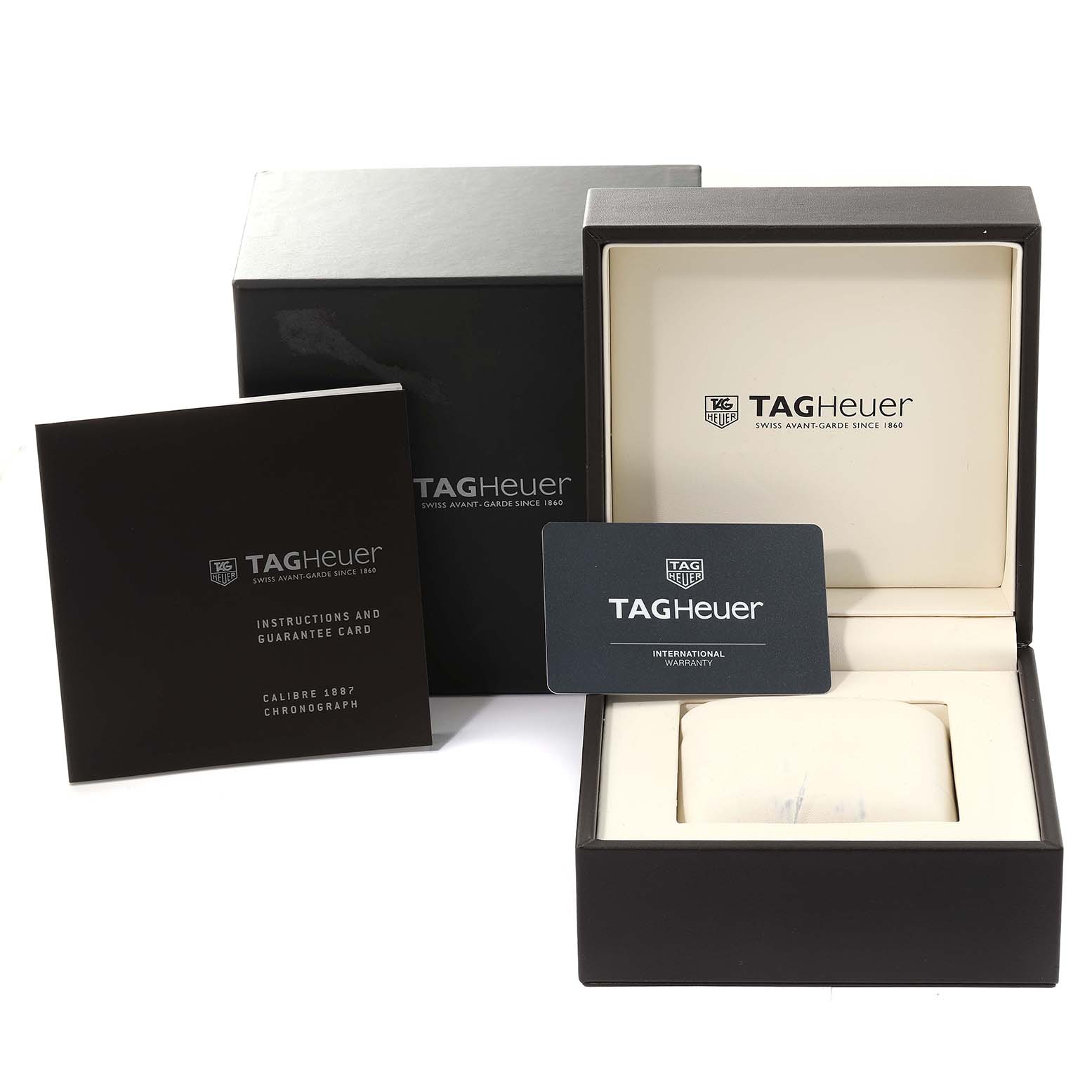 The image shows the packaging, warranty card, instructions, and padded display box for the Tag Heuer Carrera CAR2C12.FC6327 Men
s Stainless Steel Grey Dial CAR2C12.FC6327 Men
s Stainless Steel Grey Dial model watch.