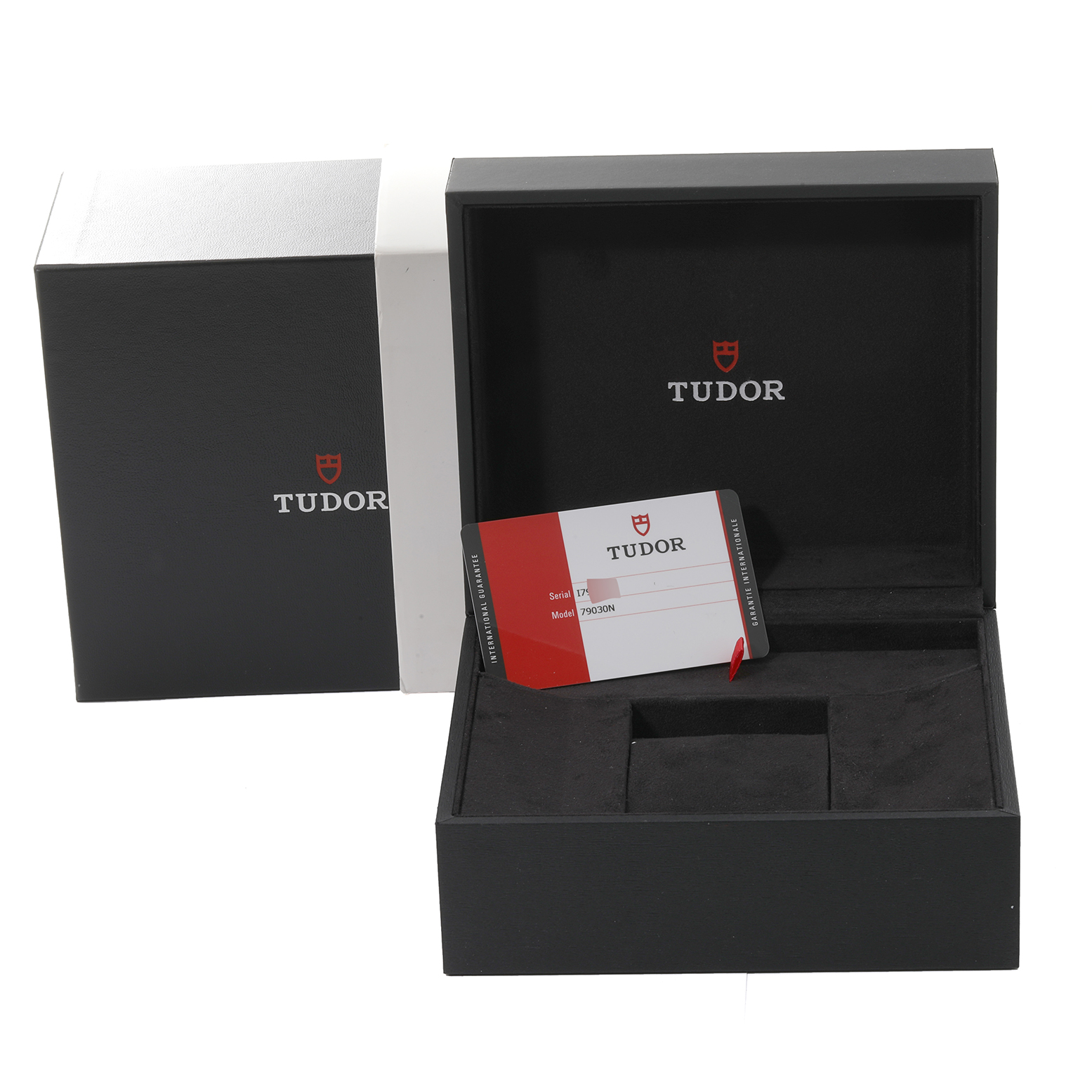 The image shows the open box and warranty card for the Tudor Heritage Black Bay 79030N Men's Stainless Steel Black Dial 79030N Men's Stainless Steel Black Dial watch model.