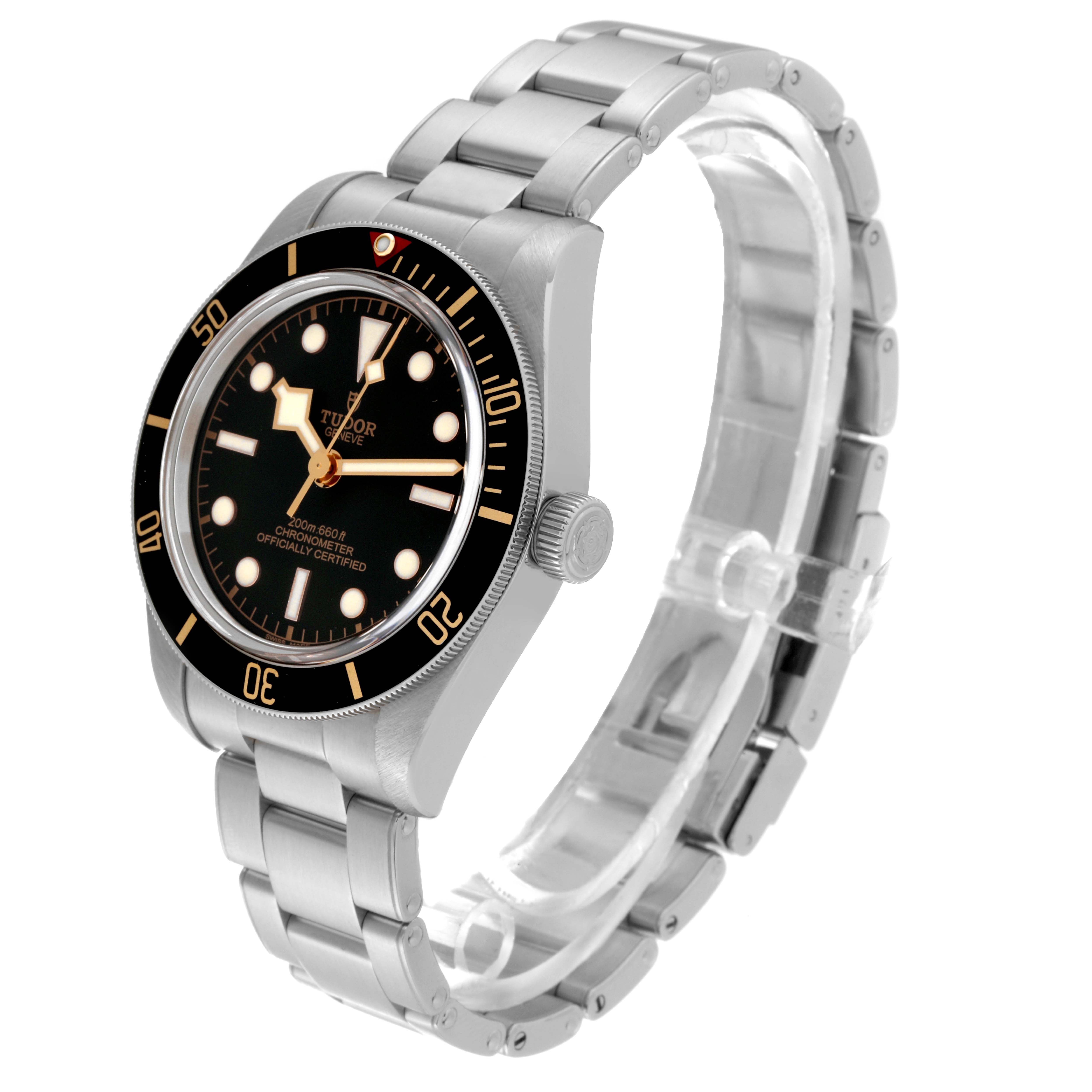 The image shows a Heritage Black Bay model by Tudor from a three-quarter view, highlighting its case, bezel, dial, and bracelet.