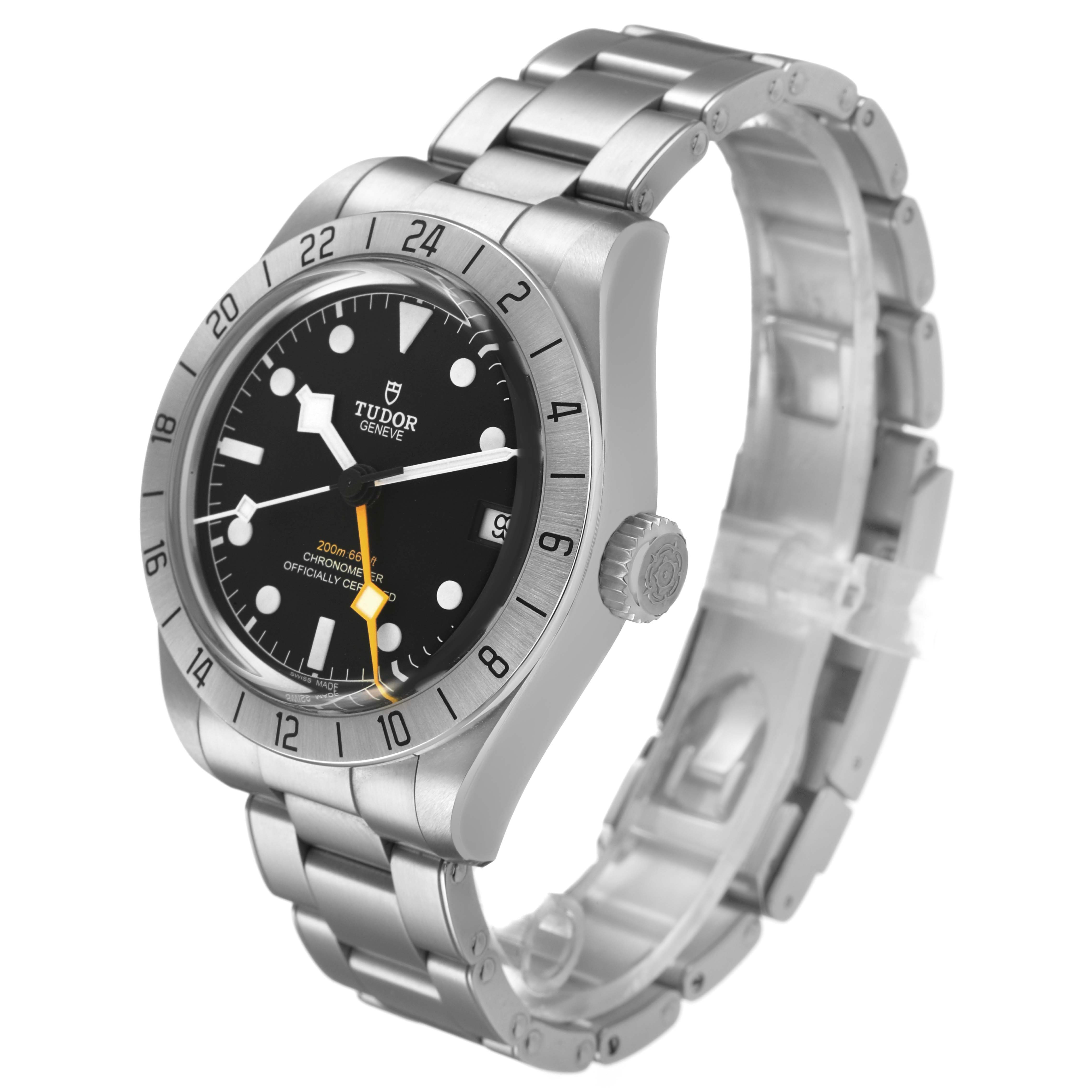 The Tudor Heritage Black Bay M79470-0001 Men's Stainless Steel Black Dial watch is shown at a three-quarter angle, displaying the bezel, crown, and metal bracelet.