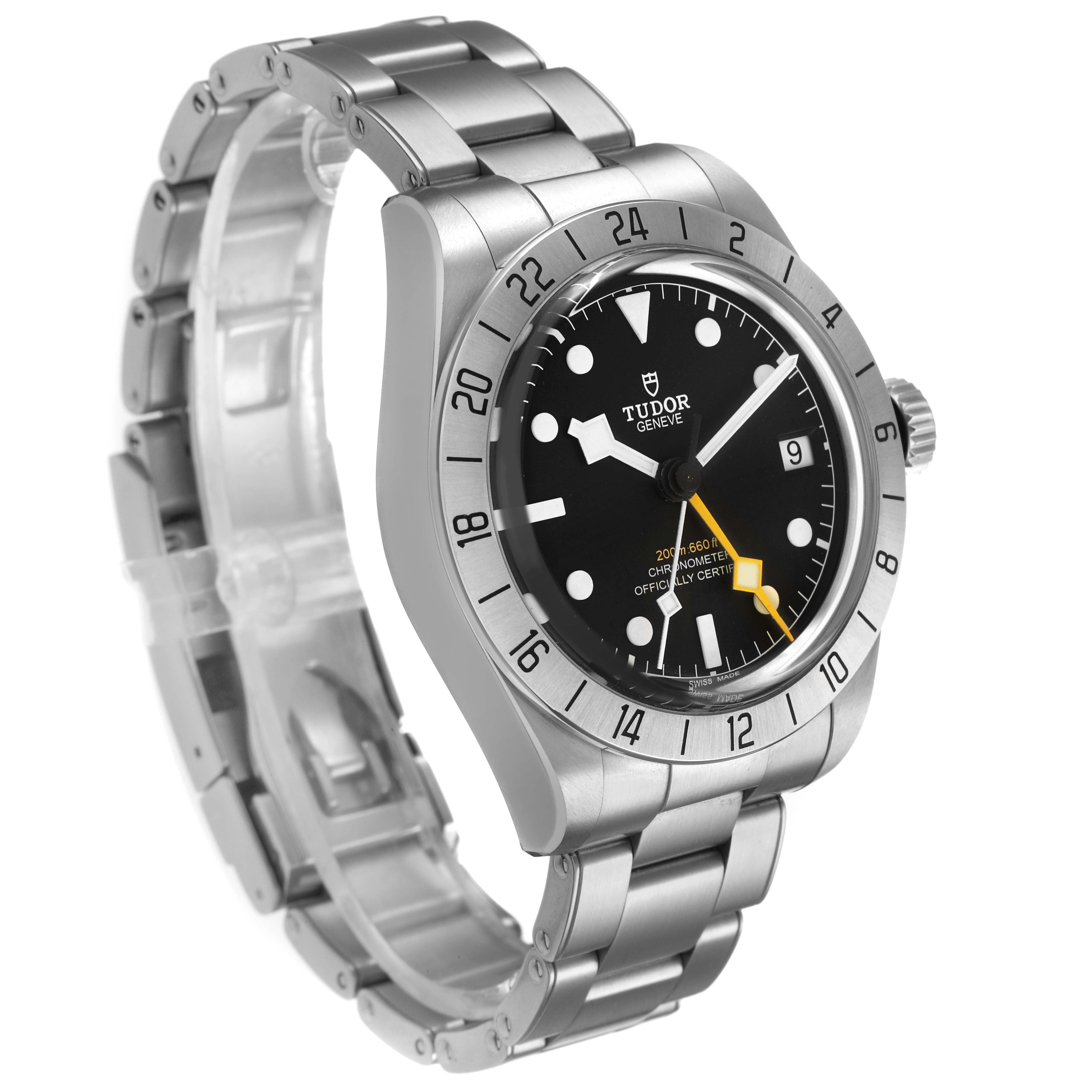 The Tudor Heritage Black Bay M79470-0001 Men's Stainless Steel Black Dial watch is shown at a three-quarter angle, highlighting the dial, bezel, crown, and bracelet.