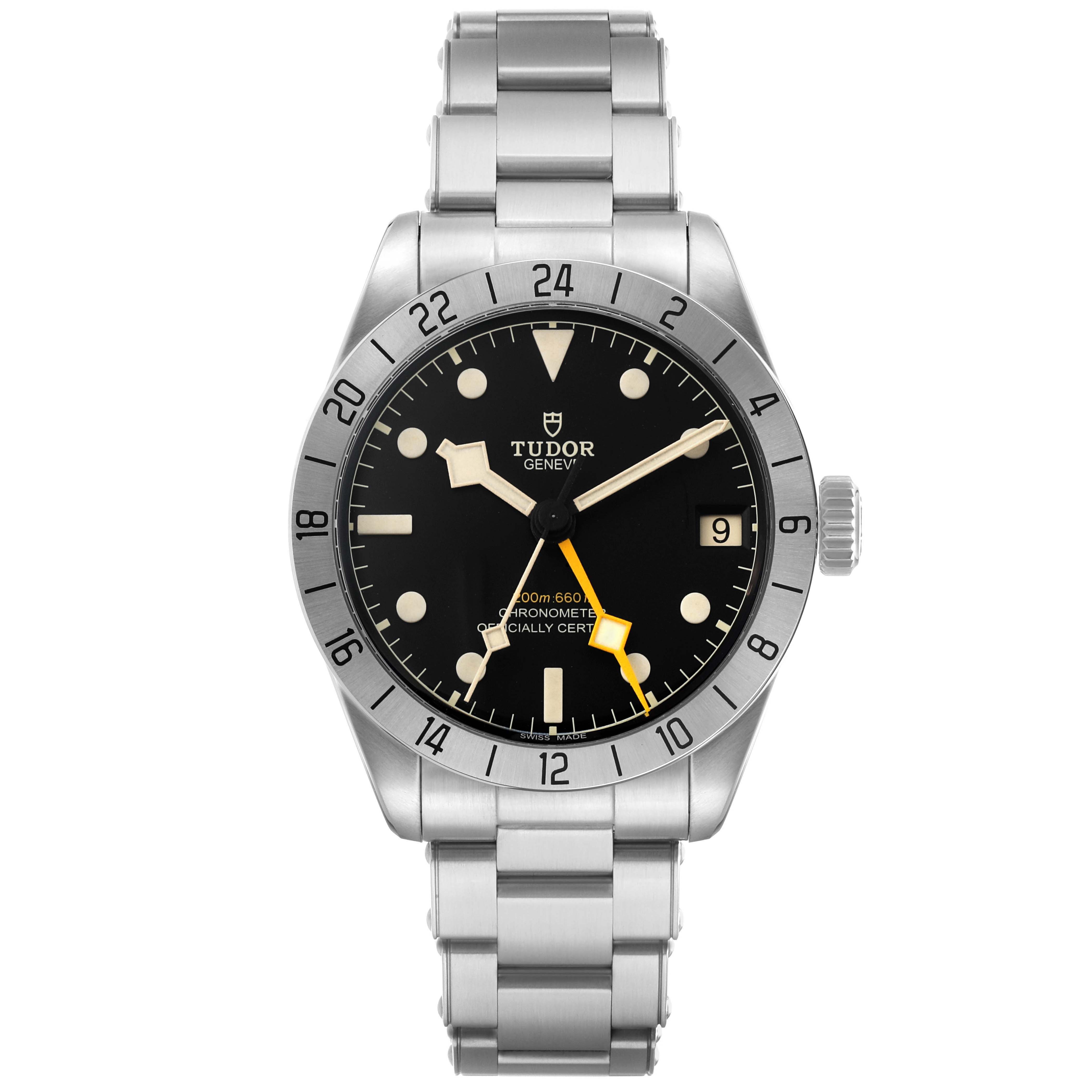 The Tudor Heritage Black Bay M79470-0001 Men's Stainless Steel Black Dial watch is shown from the front, highlighting its dial, bezel, bracelet, and crown.