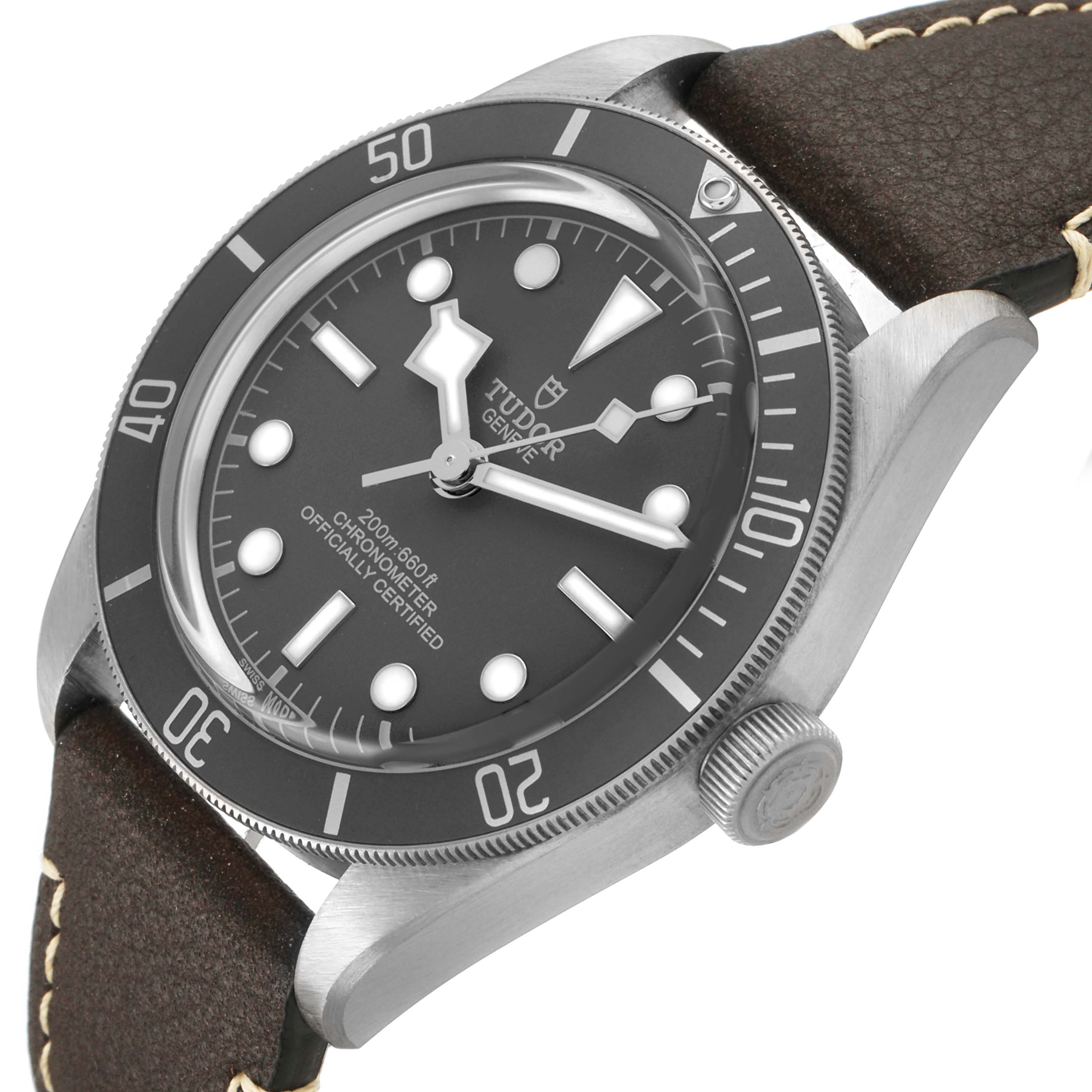 The Tudor Heritage Black Bay M79010SG-0001 Men's Stainless Steel Grey Dial watch is shown at an angled view highlighting the dial, bezel, and crown.