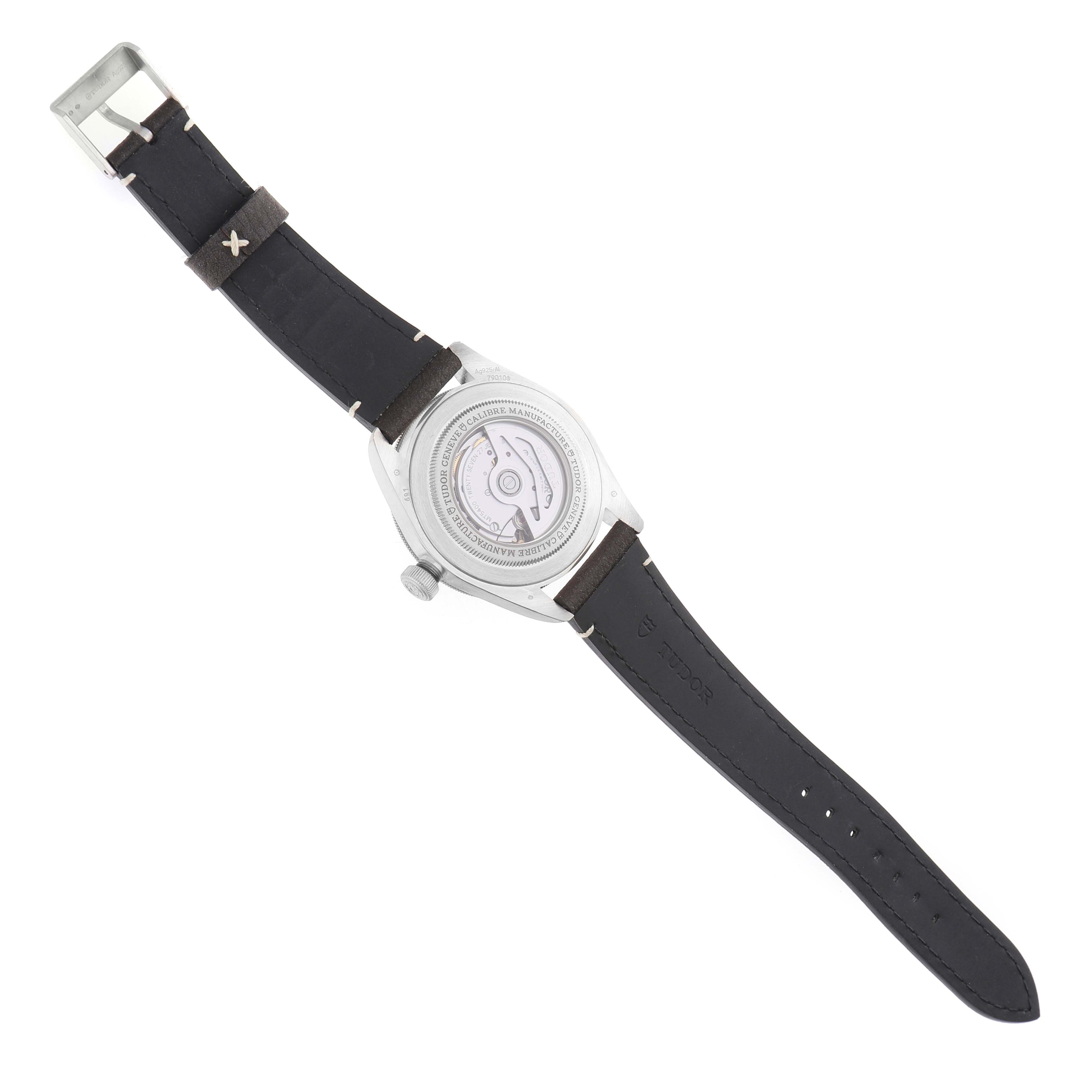 The image shows the back of the Tudor Heritage Black Bay M79010SG-0001 Men's Stainless Steel Grey Dial watch, highlighting the movement and clear case back.