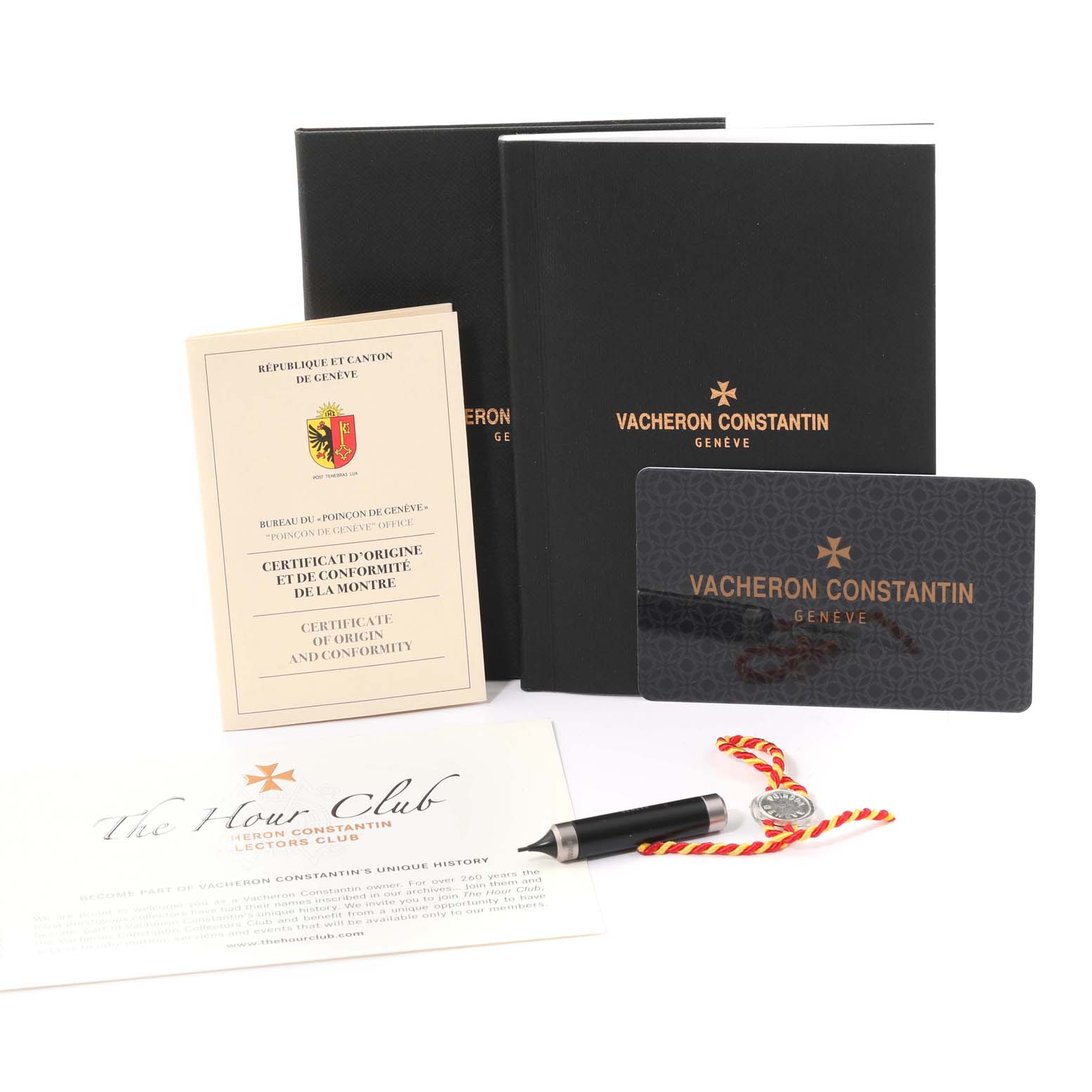 The image shows the accessories for a Vacheron Constantin Historiques 3110V/000A-B426 Men's Stainless Steel Silver Dial 3110V/000A-B426 Men's Stainless Steel Silver Dial model, including manuals, a certificate, a membership card, and a pen.