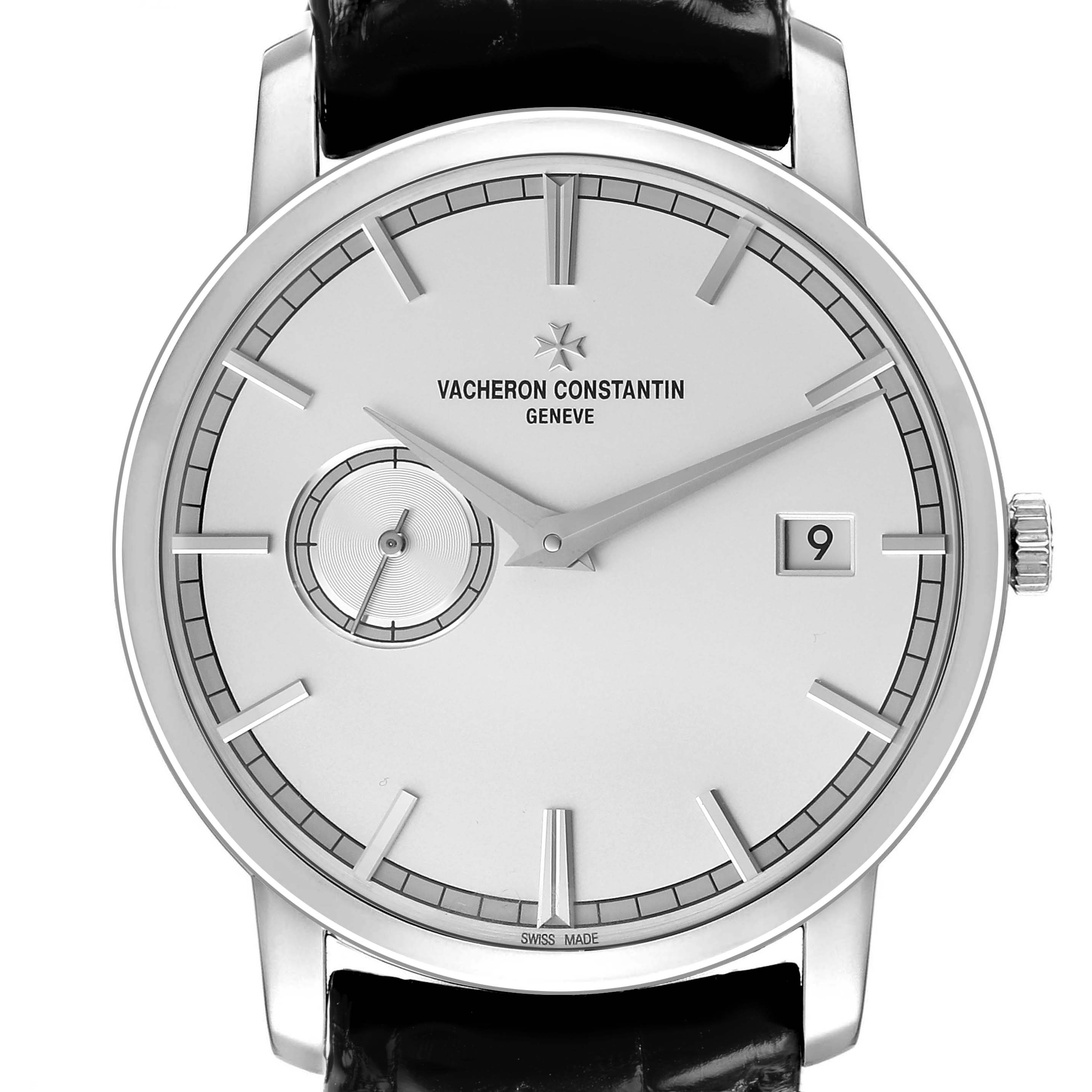 The Traditionnelle model by Vacheron Constantin is shown from a front angle, displaying the dial, hands, and date window.