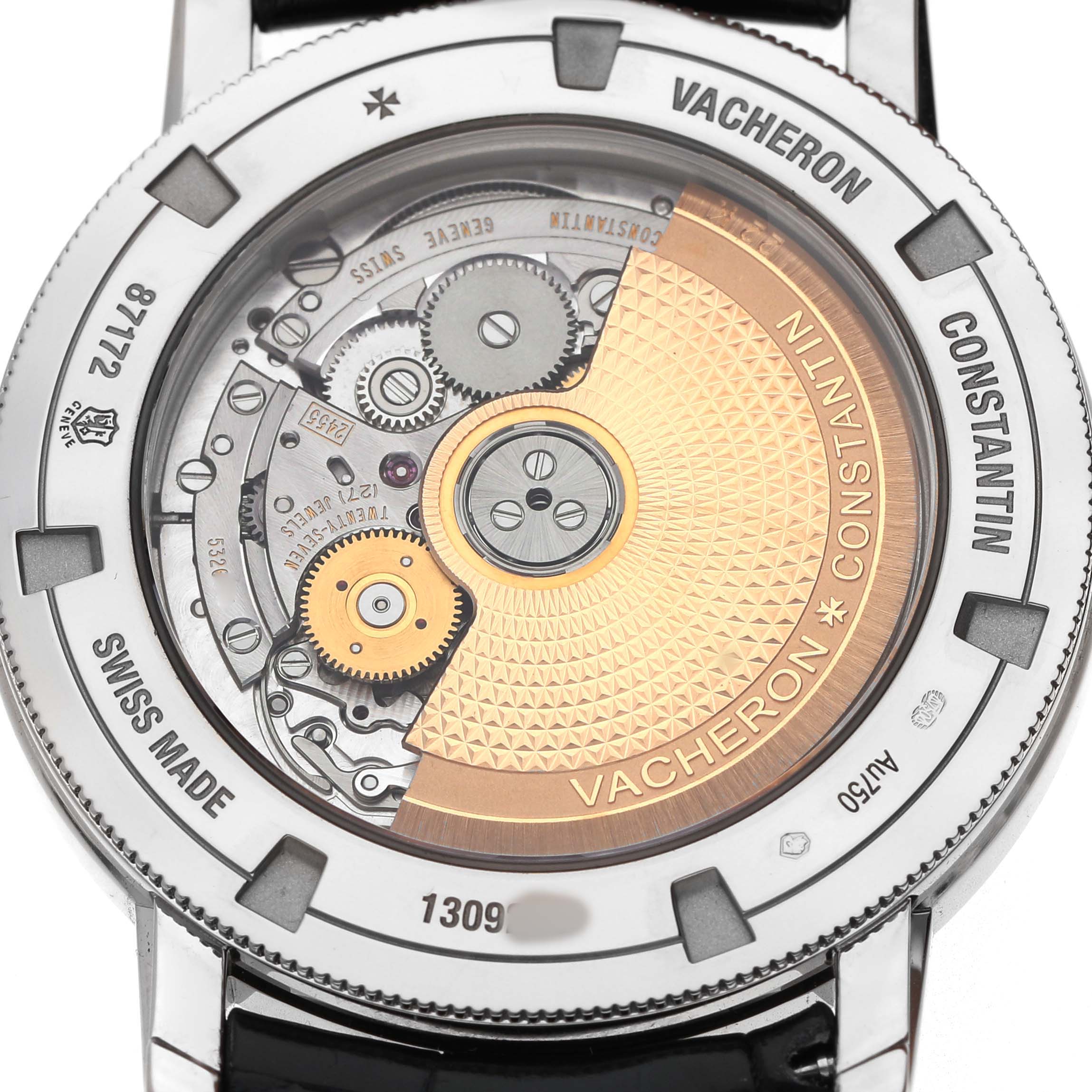 The image shows the back of a Vacheron Constantin Traditionnelle 87172/000G-9301 Men's White Gold Silver Dial watch, highlighting the mechanical movement and intricate gears.