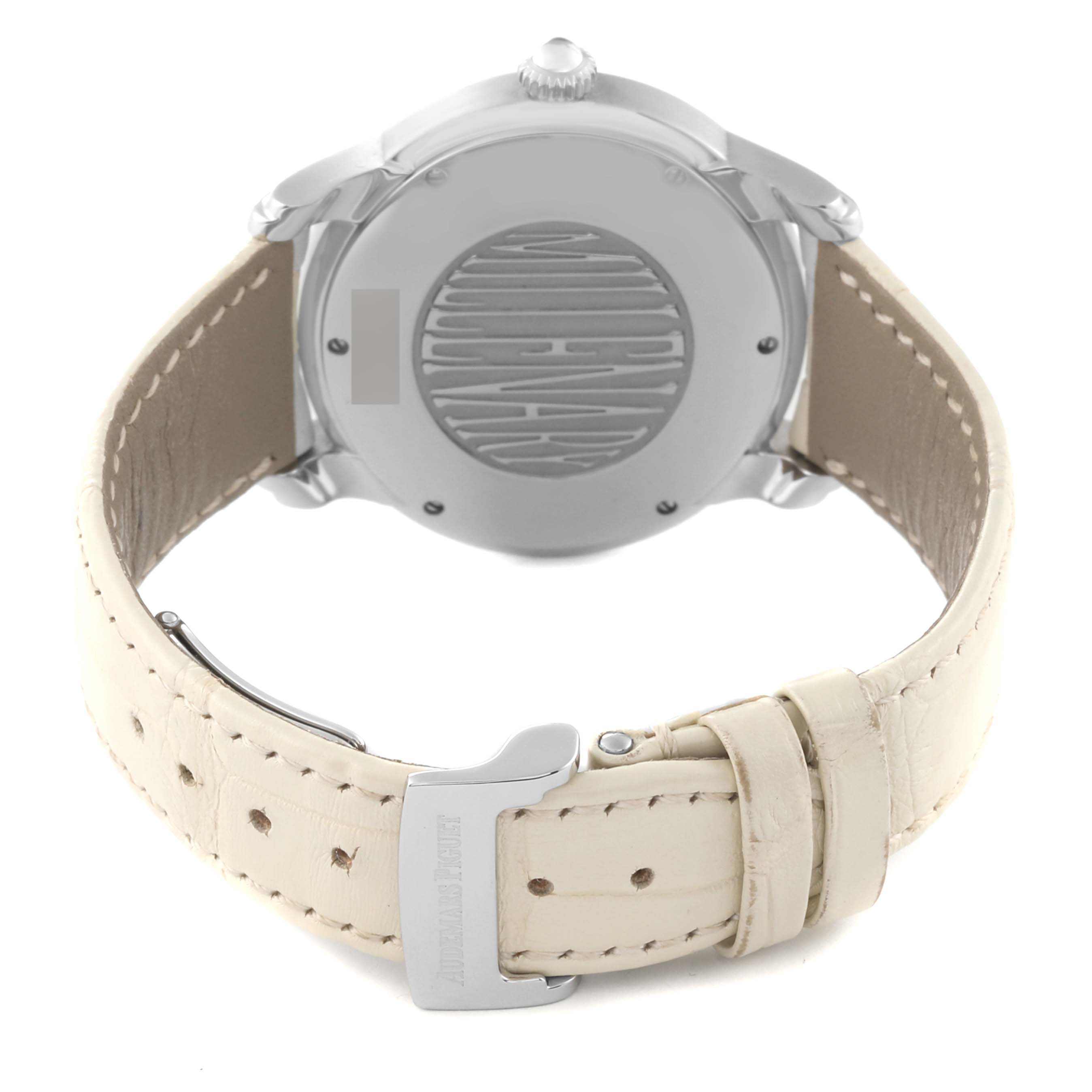 The image shows the back case and clasp of an Audemars Piguet Millenary 77301ST Women's Stainless Steel Silver Dial 77301ST Women's Stainless Steel Silver Dial watch with a light-colored leather strap.