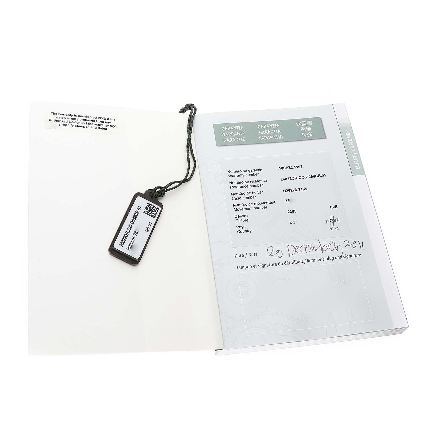 The image shows the warranty papers and tag of an Audemars Piguet Royal Oak 26022OR.OO.D098CR.01 Men's Rose Gold Silver Dial watch.