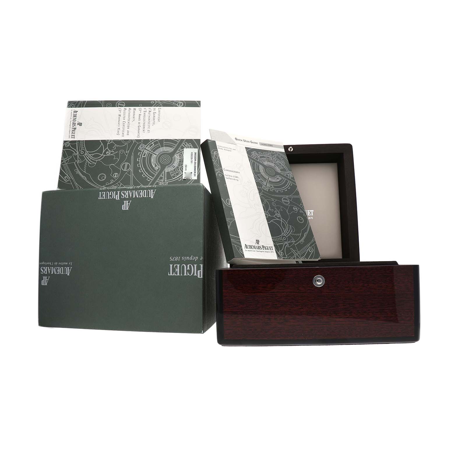 The image shows an Audemars Piguet Royal Oak 26022OR.OO.D098CR.01 Men's Rose Gold Silver Dial box, manuals, and packaging at an angle, with the box partially open.